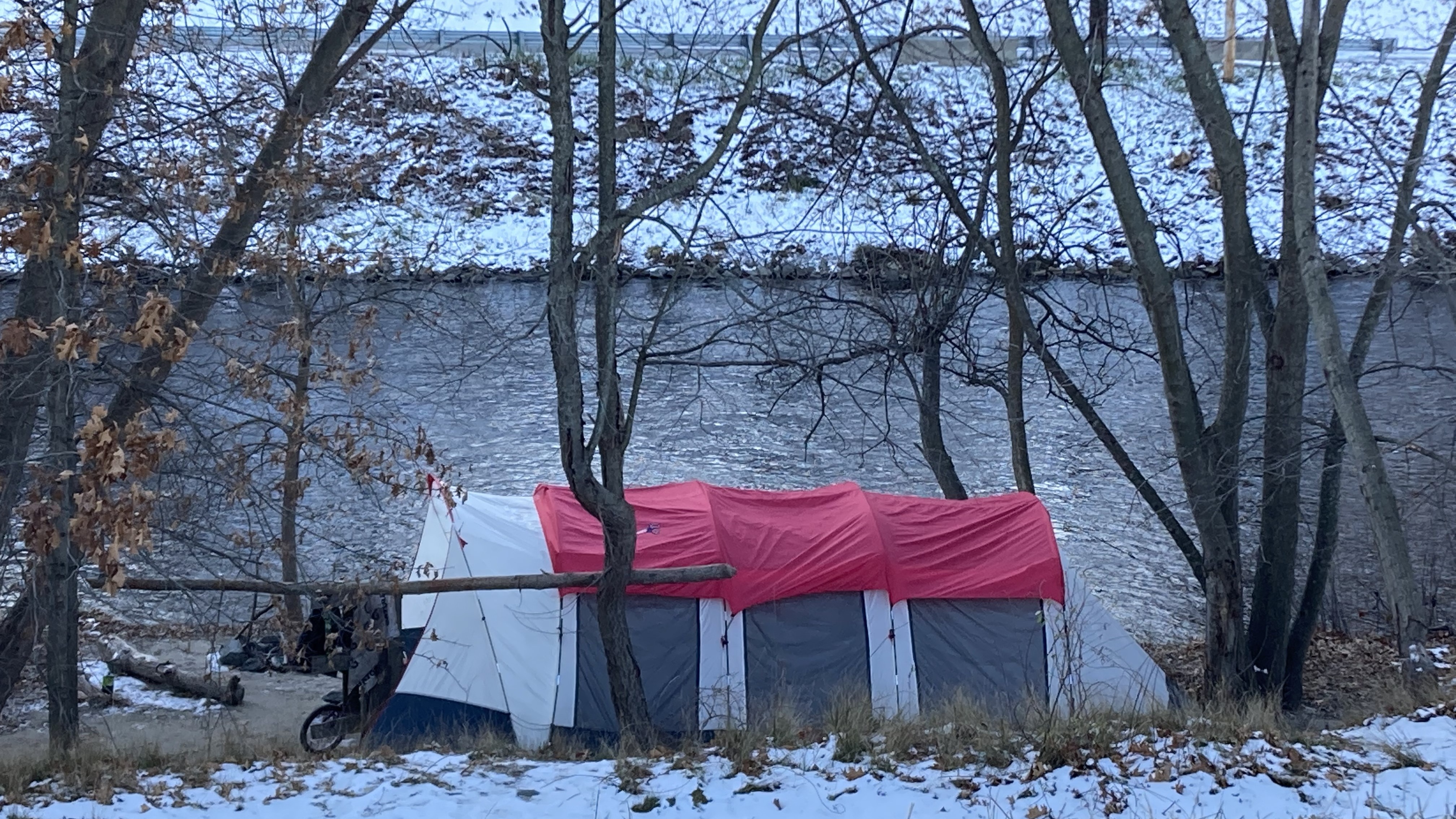 A tent encampment along the Blackstone River in Woonsocket. 