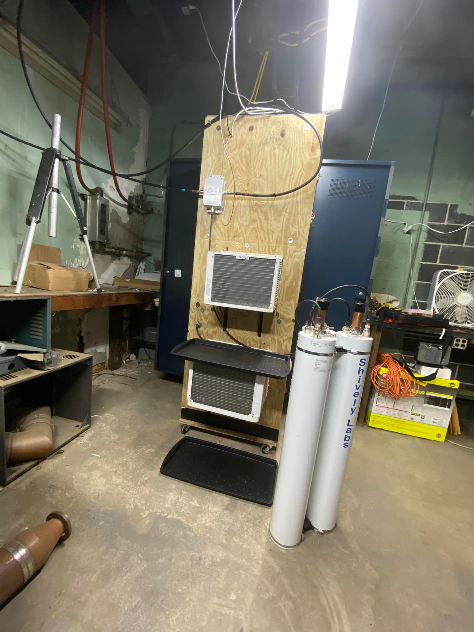Side of cabinet with wood paneling and air conditioners. Side of the W275DA rack cabinet, with wood paneling and air conditioners.