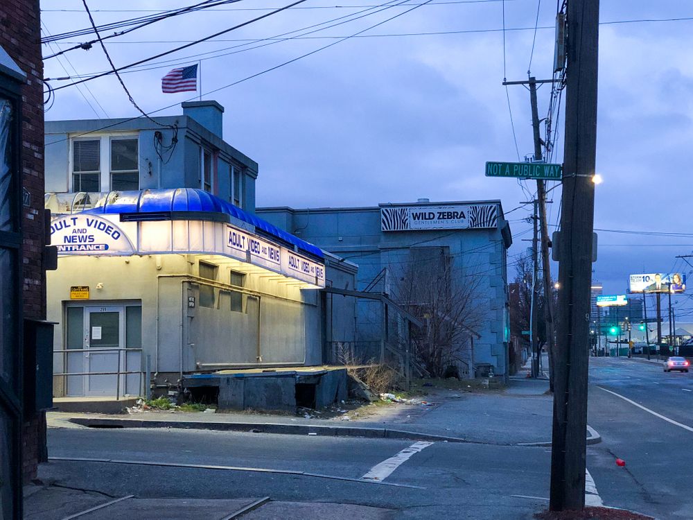 Allens Avenue, home to a handful of clubs and adult video stores, is quiet