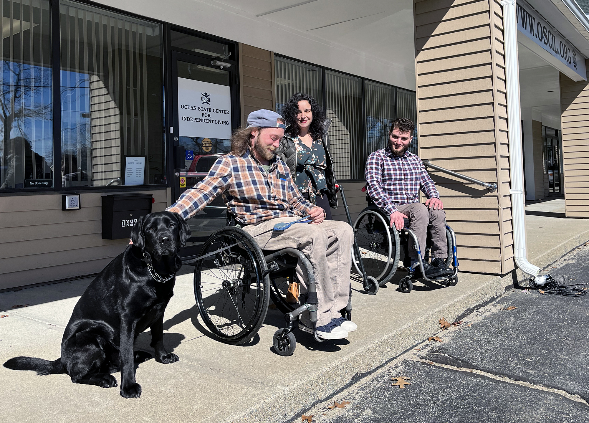 Matt DeLillo, Michelle Machado and Josh Conti work for the Ocean State Center for Independent living, a nonprofit that provides services to people with disabilities.