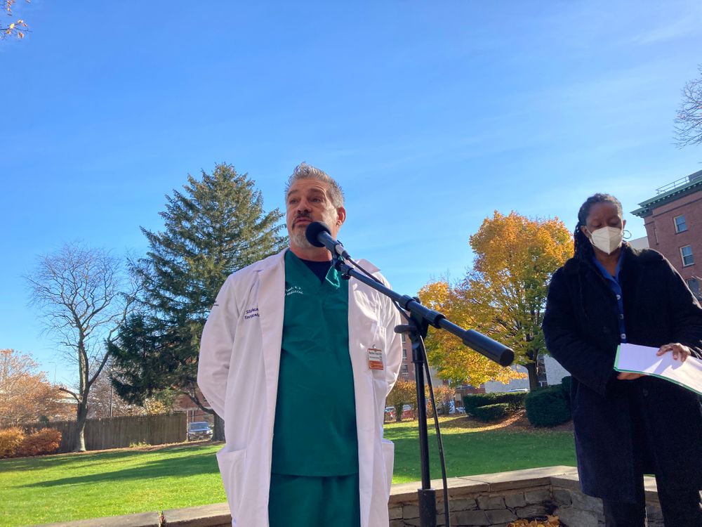 Dr. Stephen Traub, an emergency room physician at Rhode Island Hospital, and R.I. Health Director Dr. Nicole Alexander-Scott at a press conference on emergency department crowding Nov.17, 2021