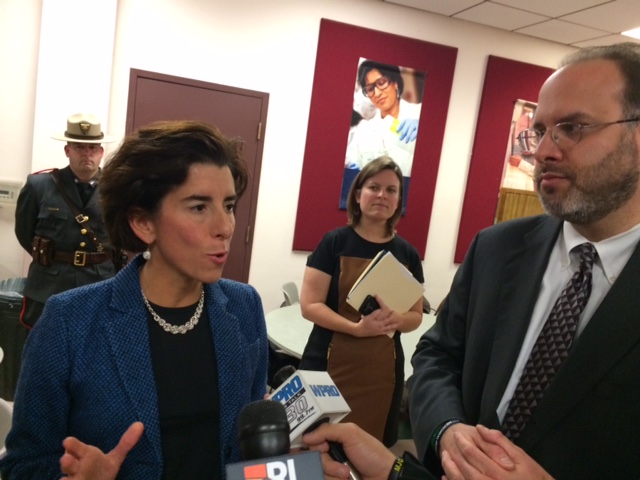 Pryor, right, after he was unveiled as former Gov. Raimondo's Commerce secretary in December 2014