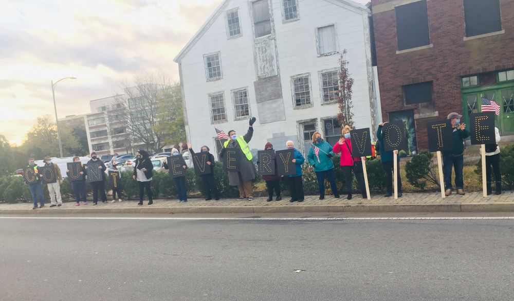 A crowd rallies to 'Count the vote' in New Bedford after President Trump told supporters on Tuesday that he wanted all voting to stop.