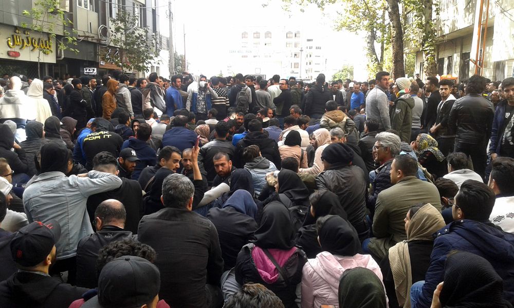 Protestors attend a demonstration after authorities raised gasoline prices, in the northern city of Sari, Iran, Saturday, Nov. 16, 2019. Protesters angered by Iran raising government-set gasoline prices by 50% blocked traffic in major cities and occasionally clashed with police Saturday after a night of demonstrations punctuated by gunfire. (Mostafa Shanechi/ ISNA via AP) Protestors attend a demonstration after authorities raised gasoline prices, in the northern city of Sari, Iran, Saturday, Nov. 16, 2019. Protesters angered by Iran raising government-set gasoline prices by 50% blocked traffic in major cities and occasionally clashed with police Saturday after a night of demonstrations punctuated by gunfire. (Mostafa Shanechi/ ISNA via AP)