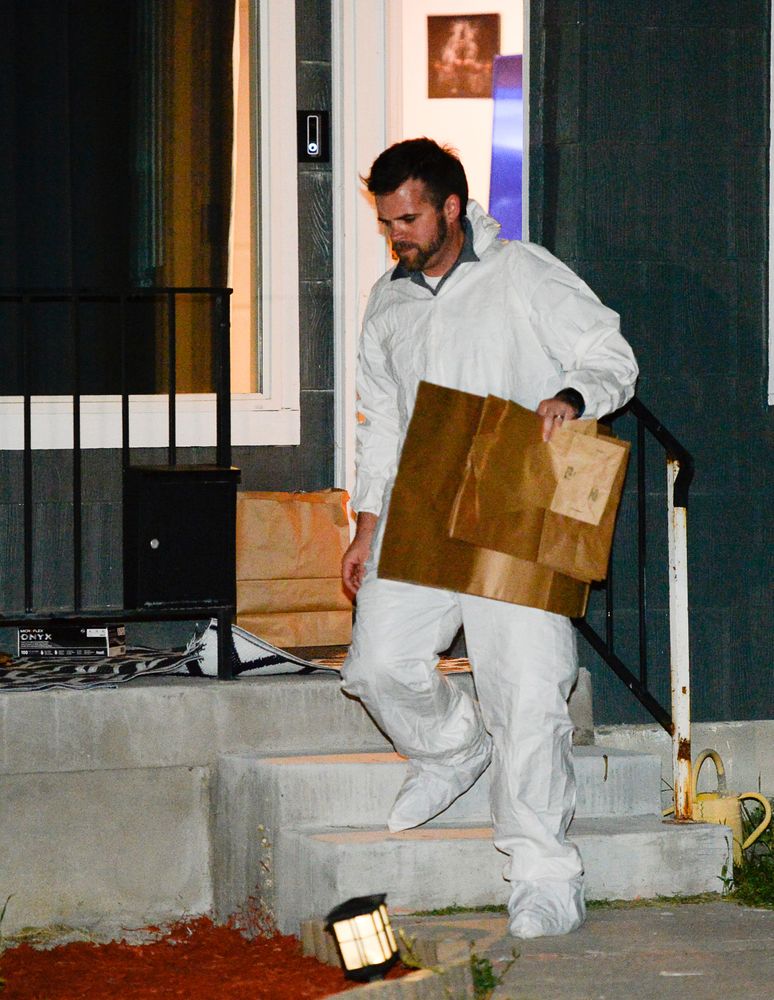Police investigators remove multiple bags of evidence during their search of a home in Salt Lake City as part of the disappearance of University of Utah student MacKenzie Lueck that carried on into the early morning hours of Thursday, June 27, 2019. (Francisco Kjolseth/The Salt Lake Tribune via AP) Police investigators remove multiple bags of evidence during their search of a home in Salt Lake City as part of the disappearance of University of Utah student MacKenzie Lueck that carried on into the early morning hours of Thursday, June 27, 2019. (Francisco Kjolseth/The Salt Lake Tribune via AP)