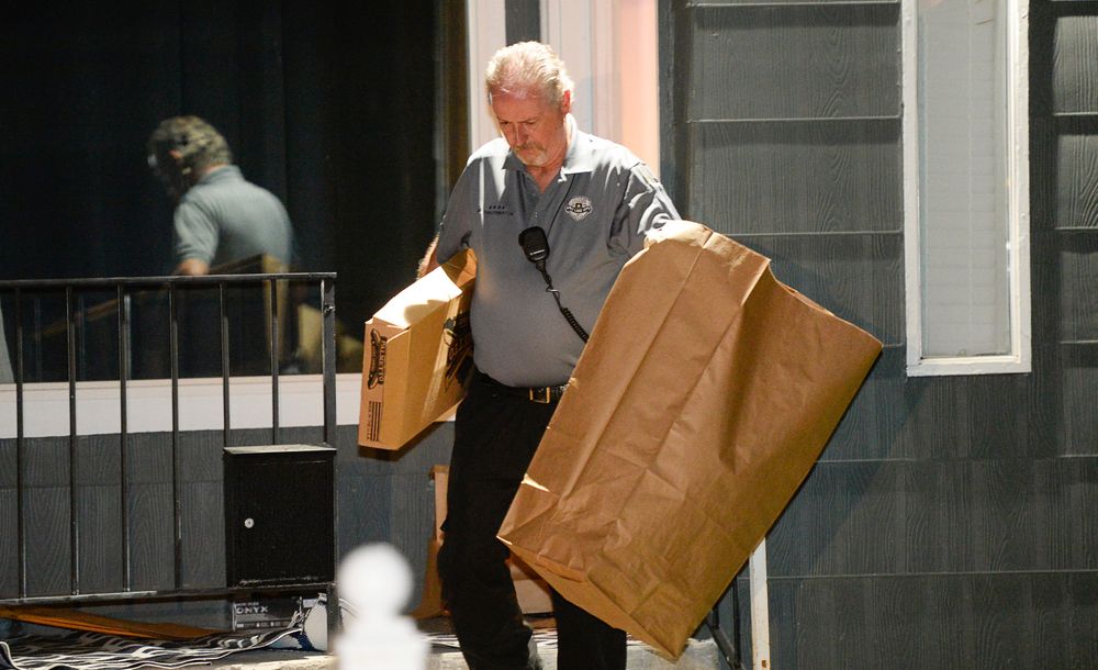Police investigators remove multiple bags of evidence during their search of a home in Salt Lake City as part of the disappearance of University of Utah student MacKenzie Lueck that carried on into the early morning hours of Thursday, June 27, 2019. (Francisco Kjolseth/The Salt Lake Tribune via AP) Police investigators remove multiple bags of evidence during their search of a home in Salt Lake City as part of the disappearance of University of Utah student MacKenzie Lueck that carried on into the early morning hours of Thursday, June 27, 2019. (Francisco Kjolseth/The Salt Lake Tribune via AP)