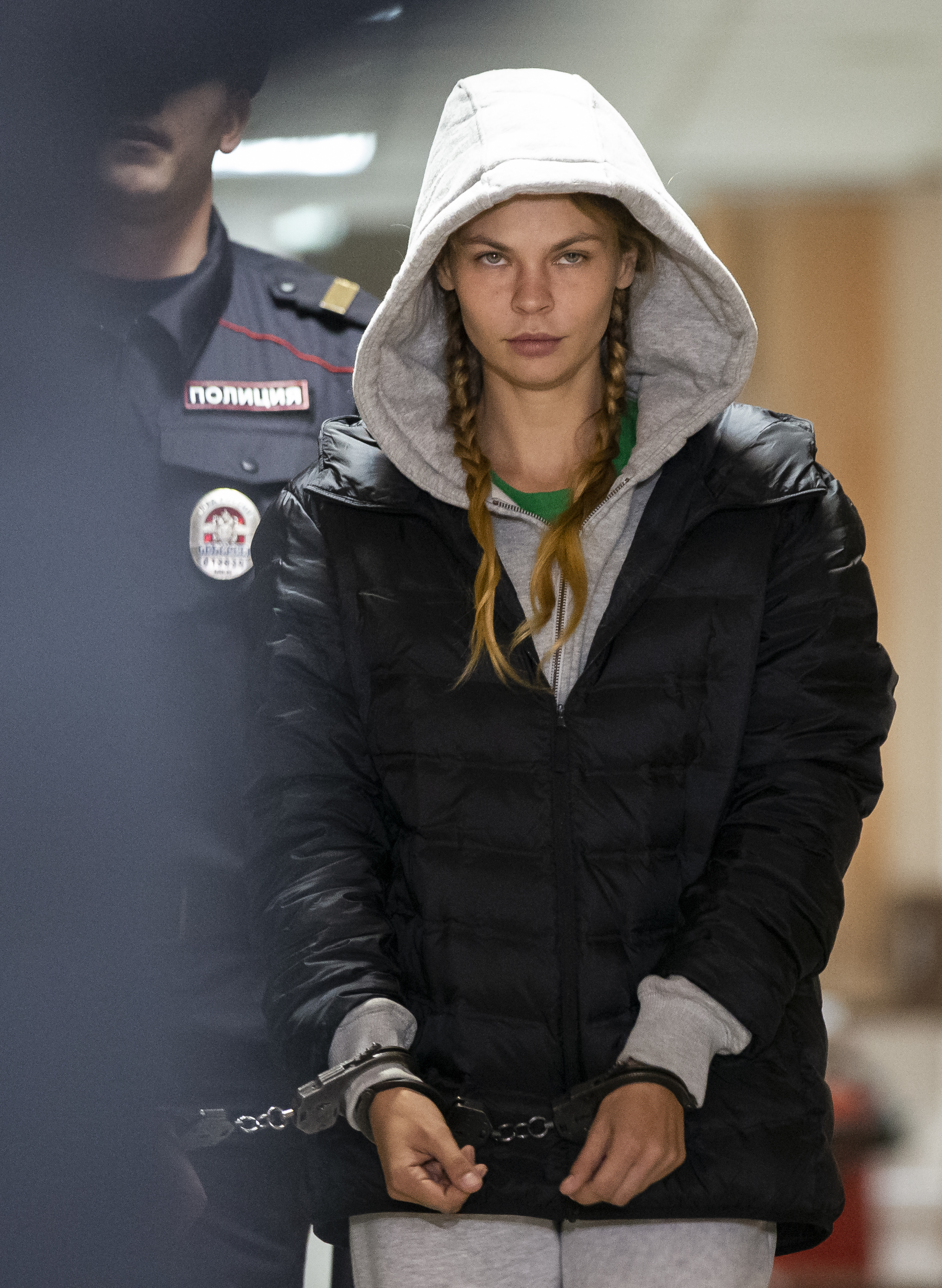 Anastasia Vashukevich, also known on social media as Nastya Rybka is escorted in the court room in Moscow, Russia, Saturday, Jan. 19, 2019. A Belarusian model who claimed last year that she had evidence of Russian interference in the election of Donald Trump as U.S. president was arrested immediately upon her arrival in Moscow on Thursday following deportation from Thailand. (AP Photo/Alexander Zemlianichenko) Anastasia Vashukevich, also known on social media as Nastya Rybka is escorted in the court room in Moscow, Russia, Saturday, Jan. 19, 2019. A Belarusian model who claimed last year that she had evidence of Russian interference in the election of Donald Trump as U.S. president was arrested immediately upon her arrival in Moscow on Thursday following deportation from Thailand. (AP Photo/Alexander Zemlianichenko)