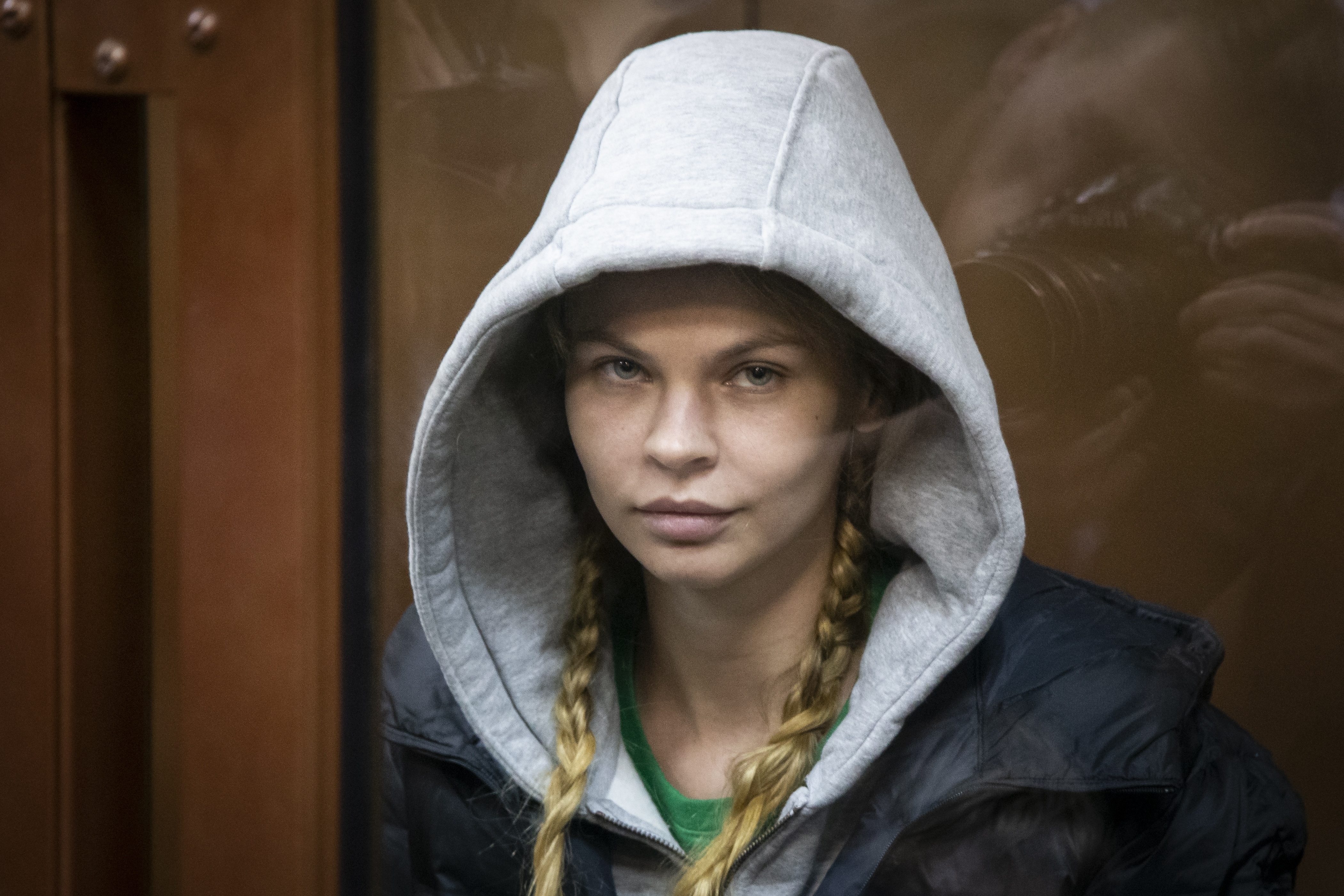Anastasia Vashukevich, also known on social media as Nastya Rybka, sits in a cage in the court room in Moscow, Russia, Saturday, Jan. 19, 2019. A Belarusian model who claimed last year that she had evidence of Russian interference in the election of Donald Trump as U.S. president was arrested immediately upon her arrival in Moscow on Thursday following deportation from Thailand. (AP Photo/Alexander Zemlianichenko) Anastasia Vashukevich, also known on social media as Nastya Rybka, sits in a cage in the court room in Moscow, Russia, Saturday, Jan. 19, 2019. A Belarusian model who claimed last year that she had evidence of Russian interference in the election of Donald Trump as U.S. president was arrested immediately upon her arrival in Moscow on Thursday following deportation from Thailand. (AP Photo/Alexander Zemlianichenko)
