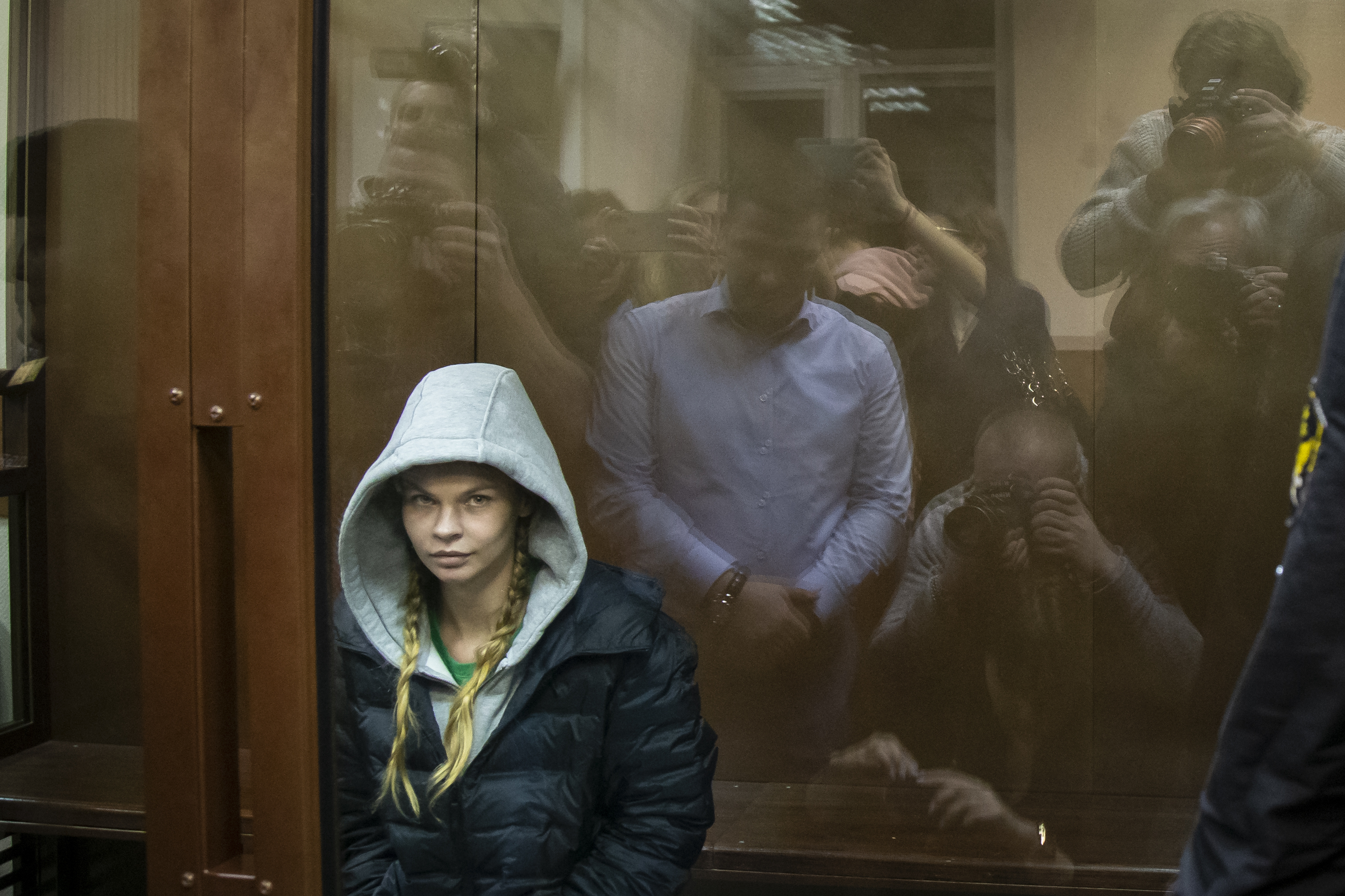 Anastasia Vashukevich, also known on social media as Nastya Rybka sits in a cage in the court room in Moscow, Russia, Saturday, Jan. 19, 2019. A Belarusian model who claimed last year that she had evidence of Russian interference in the election of Donald Trump as U.S. president, was arrested on her arrival in Moscow Thursday following deportation from Thailand. (AP Photo/Alexander Zemlianichenko) Anastasia Vashukevich, also known on social media as Nastya Rybka sits in a cage in the court room in Moscow, Russia, Saturday, Jan. 19, 2019. A Belarusian model who claimed last year that she had evidence of Russian interference in the election of Donald Trump as U.S. president, was arrested on her arrival in Moscow Thursday following deportation from Thailand. (AP Photo/Alexander Zemlianichenko)