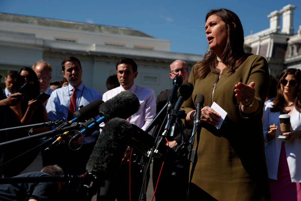 White House press secretary Sarah Sanders talks to reporters outside the White House, Friday, May 31, 2019, in Washington. (AP Photo/Evan Vucci) White House press secretary Sarah Sanders talks to reporters outside the White House, Friday, May 31, 2019, in Washington. (AP Photo/Evan Vucci)
