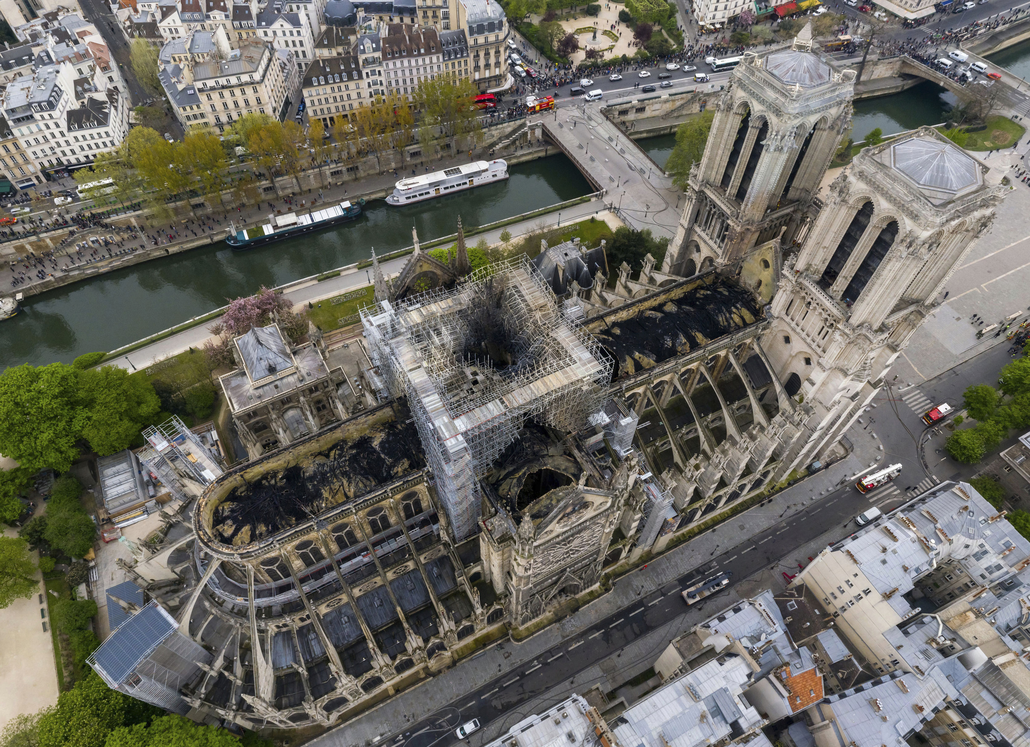 An image made available by Gigarama.ru on Wednesday April 17, 2019 shows an aerial shot of the fire damage to Notre Dame cathedral in Paris on Tuesday April 16. Nearly $1 billion has already poured in from ordinary worshippers and high-powered magnates around the world to restore Notre Dame Cathedral in Paris after it was damaged in a massive fire on Monday. (Gigarama.ru via AP) An image made available by Gigarama.ru on Wednesday April 17, 2019 shows an aerial shot of the fire damage to Notre Dame cathedral in Paris on Tuesday April 16. Nearly $1 billion has already poured in from ordinary worshippers and high-powered magnates around the world to restore Notre Dame Cathedral in Paris after it was damaged in a massive fire on Monday. (Gigarama.ru via AP)
