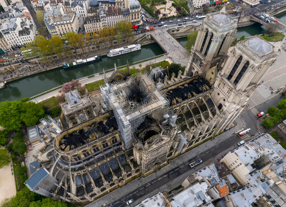 An image made available by Gigarama.ru on Wednesday April 17, 2019 shows an aerial shot of the fire damage to Notre Dame cathedral in Paris on Tuesday April 16. Nearly $1 billion has already poured in from ordinary worshippers and high-powered magnates around the world to restore Notre Dame Cathedral in Paris after it was damaged in a massive fire on Monday. (Gigarama.ru via AP) An image made available by Gigarama.ru on Wednesday April 17, 2019 shows an aerial shot of the fire damage to Notre Dame cathedral in Paris on Tuesday April 16. Nearly $1 billion has already poured in from ordinary worshippers and high-powered magnates around the world to restore Notre Dame Cathedral in Paris after it was damaged in a massive fire on Monday. (Gigarama.ru via AP)