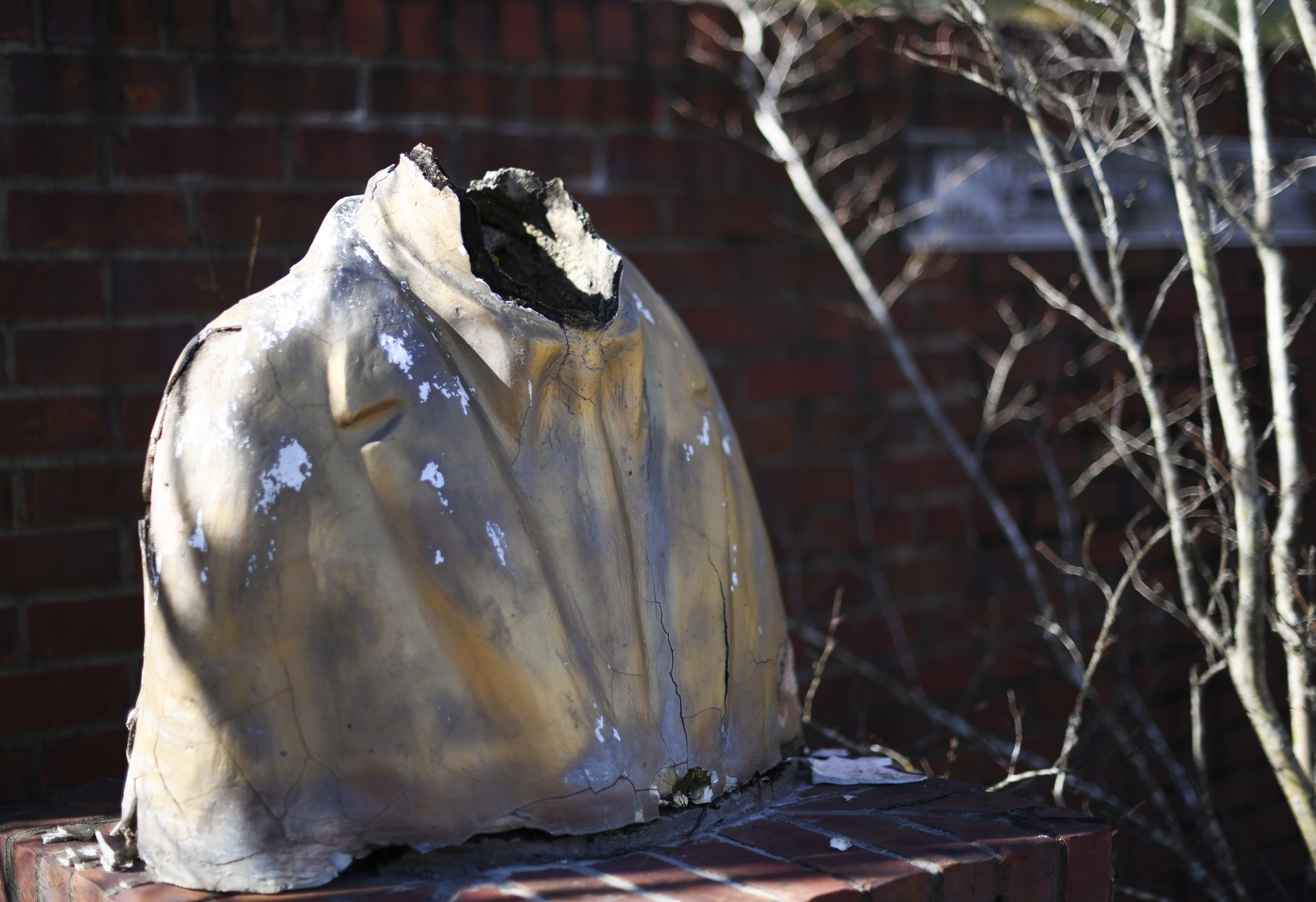 A vandalized bust remains on display at what was the Africatown Welcome Center in Mobile, Ala., on Tuesday, Jan. 29, 2019. The center was destroyed by Hurricane Katrina in 2005, and hasn't been rebuilt. (AP Photo/Julie Bennett) A vandalized bust remains on display at what was the Africatown Welcome Center in Mobile, Ala., on Tuesday, Jan. 29, 2019. The center was destroyed by Hurricane Katrina in 2005, and hasn't been rebuilt. (AP Photo/Julie Bennett)