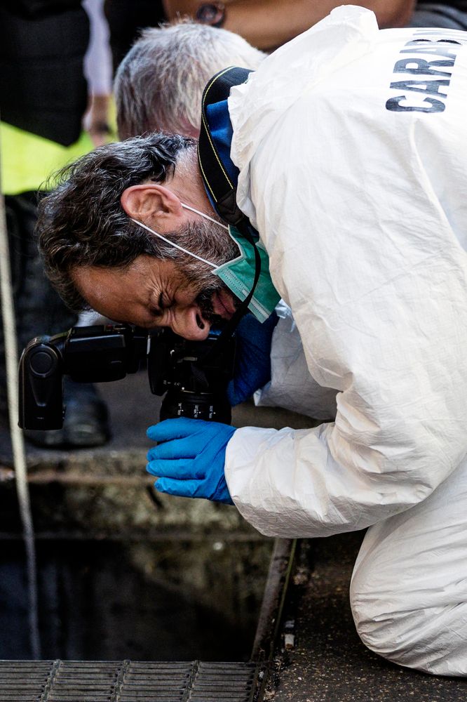 In this picture taken Friday, July 26, 2019 investigators are seen on the scene where an Italian paramilitary policeman was stabbed to death. A young American tourist has confessed Saturday, July 27, 2019, to fatally stabbing an Italian paramilitary policeman who was investigating the theft of a bag and cellphone before dawn Friday, (Angelo Carconi/ANSA via AP) In this picture taken Friday, July 26, 2019 investigators are seen on the scene where an Italian paramilitary policeman was stabbed to death. A young American tourist has confessed Saturday, July 27, 2019, to fatally stabbing an Italian paramilitary policeman who was investigating the theft of a bag and cellphone before dawn Friday, (Angelo Carconi/ANSA via AP)
