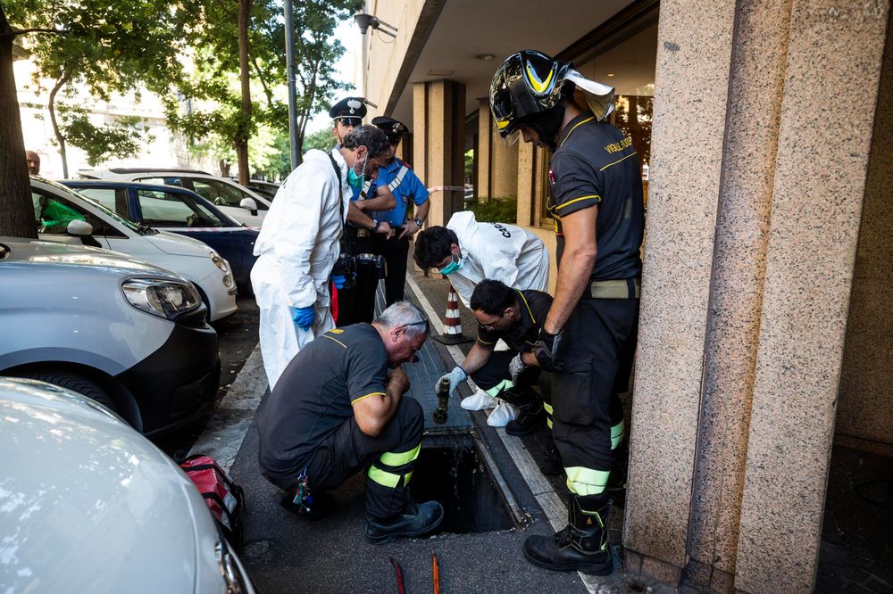 In this picture taken Friday, July 26, 2019 investigators are seen on the scene where an Italian paramilitary policeman was stabbed to death. A young American tourist has confessed Saturday, July 27, 2019, to fatally stabbing an Italian paramilitary policeman who was investigating the theft of a bag and cellphone before dawn Friday, (Angelo Carconi/ANSA via AP) In this picture taken Friday, July 26, 2019 investigators are seen on the scene where an Italian paramilitary policeman was stabbed to death. A young American tourist has confessed Saturday, July 27, 2019, to fatally stabbing an Italian paramilitary policeman who was investigating the theft of a bag and cellphone before dawn Friday, (Angelo Carconi/ANSA via AP)