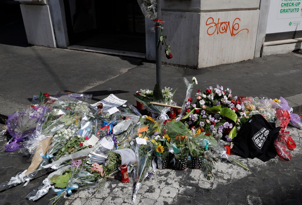 Flowers and messages left by Roman citizens on the spot where Mario Cerciello Rega was stabbed to death, in Rome, Saturday, July 27, 2019. In a statement Saturday, Carabinieri officers investigating the death Friday of officer Cerciello Rega, 35, said two American turists, both 19, have been detained for alleged murder and attempted extortion. (AP Photo/Andrew Medichini) Flowers and messages left by Roman citizens on the spot where Mario Cerciello Rega was stabbed to death, in Rome, Saturday, July 27, 2019. In a statement Saturday, Carabinieri officers investigating the death Friday of officer Cerciello Rega, 35, said two American turists, both 19, have been detained for alleged murder and attempted extortion. (AP Photo/Andrew Medichini)