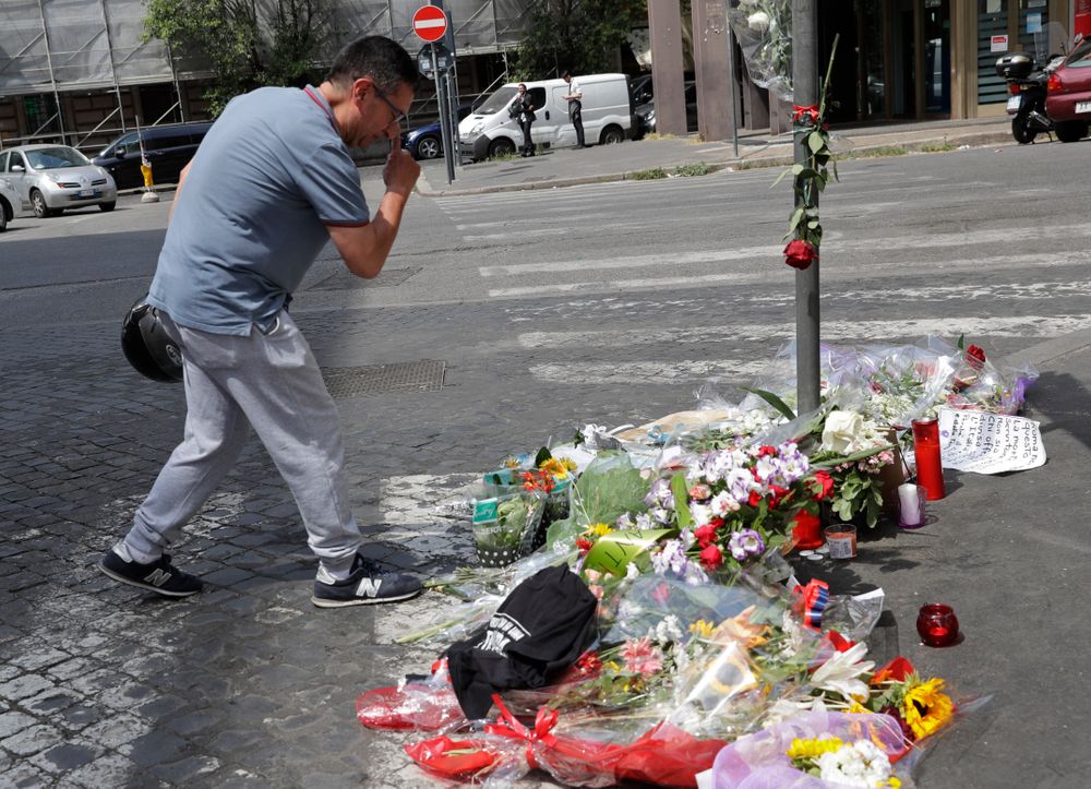 A man wipes his eyes after leaving flowers on the spot where Mario Cerciello Rega was stabbed to death, in Rome, Saturday, July 27, 2019. In a statement Saturday, Carabinieri officers investigating the death Friday of officer Cerciello Rega, 35, said two American turists, both 19, have been detained for alleged murder and attempted extortion. (AP Photo/Andrew Medichini) A man wipes his eyes after leaving flowers on the spot where Mario Cerciello Rega was stabbed to death, in Rome, Saturday, July 27, 2019. In a statement Saturday, Carabinieri officers investigating the death Friday of officer Cerciello Rega, 35, said two American turists, both 19, have been detained for alleged murder and attempted extortion. (AP Photo/Andrew Medichini)