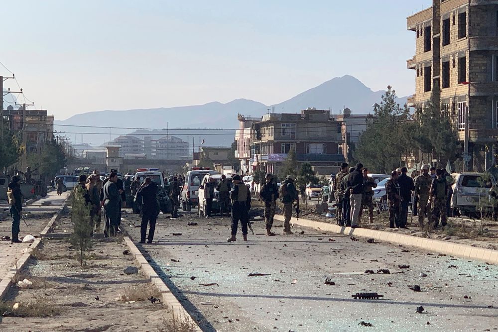 Afghan security personnel gather at the site of an explosion in Kabul, Afghanistan, Wednesday, Nov. 13, 2019. An explosion has rocked the Afghan capital of Kabul as early morning commuters were on the street heading to work. (AP Photo/Rahmat Gul) Afghan security personnel gather at the site of an explosion in Kabul, Afghanistan, Wednesday, Nov. 13, 2019. An explosion has rocked the Afghan capital of Kabul as early morning commuters were on the street heading to work. (AP Photo/Rahmat Gul)