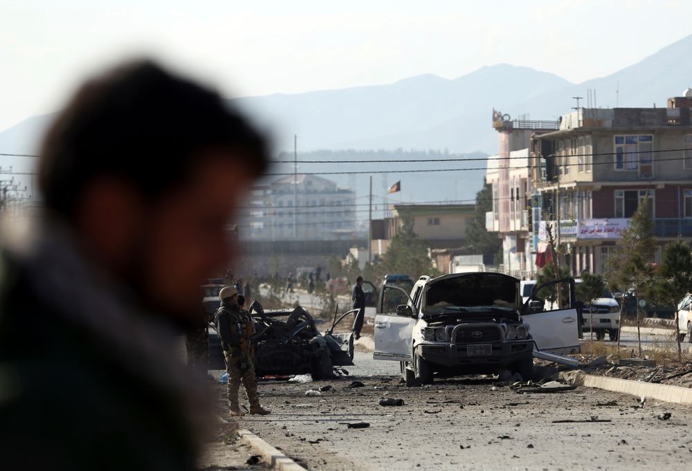 Afghan security personnel gather at the site of car bomb attack in Kabul, Afghanistan, Wednesday, Nov. 13, 2019. A car bomb detonated in the Afghan capital of Kabul during Wednesday's morning commute, killing several people, officials said. (AP Photo/Rahmat Gul) Afghan security personnel gather at the site of car bomb attack in Kabul, Afghanistan, Wednesday, Nov. 13, 2019. A car bomb detonated in the Afghan capital of Kabul during Wednesday's morning commute, killing several people, officials said. (AP Photo/Rahmat Gul)