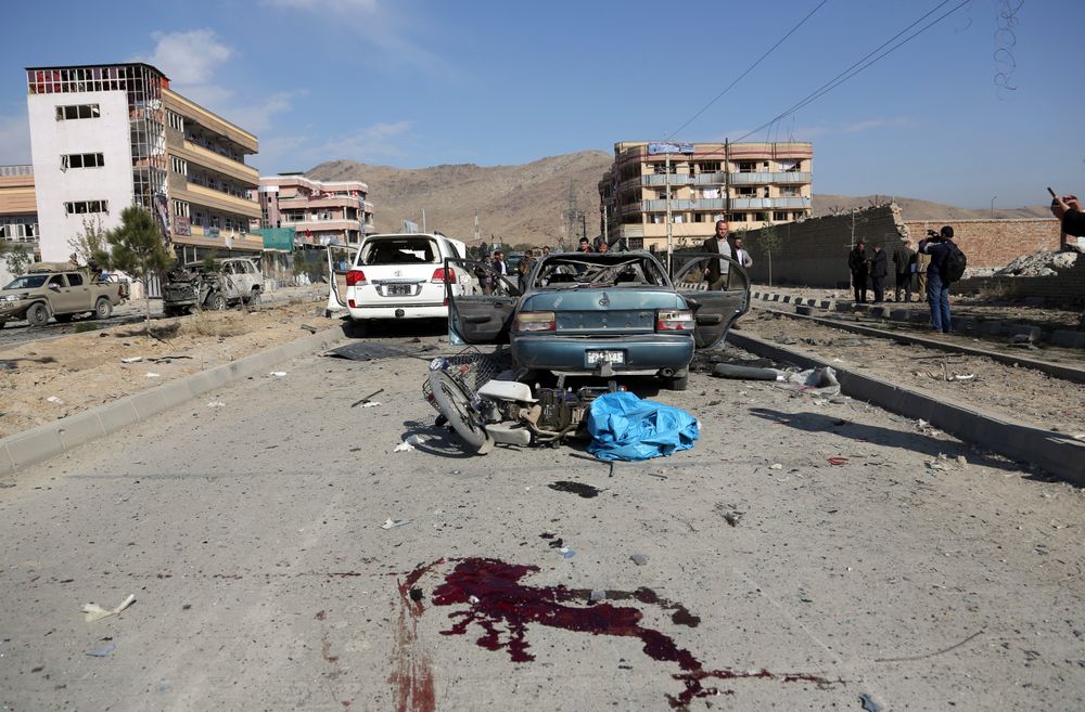 Blood stains the ground after a car bomb attack in Kabul, Afghanistan, Wednesday, Nov. 13, 2019. A car bomb detonated in the Afghan capital during Wednesday's morning commute, killing seven people and wounding at least seven, officials said. (AP Photo/Rahmat Gul) Blood stains the ground after a car bomb attack in Kabul, Afghanistan, Wednesday, Nov. 13, 2019. A car bomb detonated in the Afghan capital during Wednesday's morning commute, killing seven people and wounding at least seven, officials said. (AP Photo/Rahmat Gul)