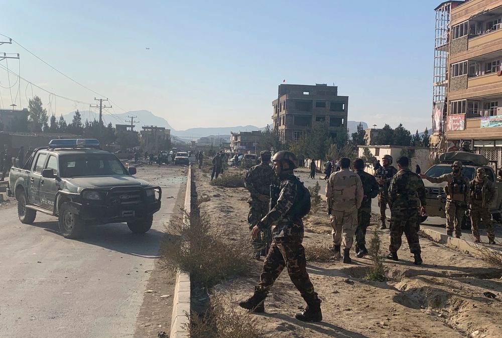 Afghan security personnel gather at the site of an explosion in Kabul, Afghanistan, Wednesday, Nov. 13, 2019. An explosion has rocked the Afghan capital of Kabul as early morning commuters were on the street heading to work. (AP Photo/Rahmat Gul) Afghan security personnel gather at the site of an explosion in Kabul, Afghanistan, Wednesday, Nov. 13, 2019. An explosion has rocked the Afghan capital of Kabul as early morning commuters were on the street heading to work. (AP Photo/Rahmat Gul)