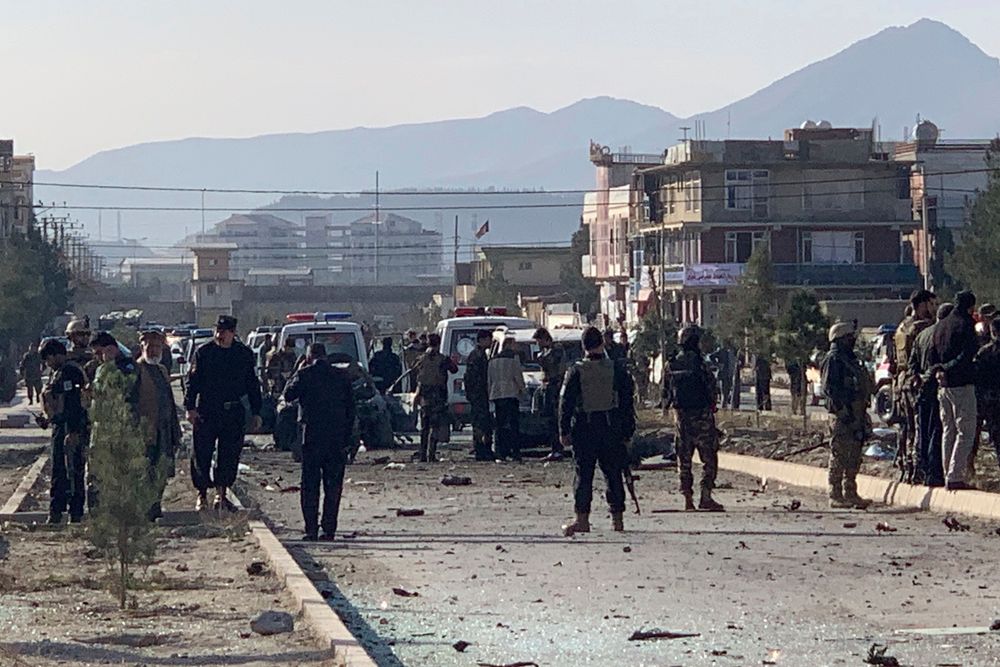 Afghan security personnel gather at the site of an explosion in Kabul, Afghanistan, Wednesday, Nov. 13, 2019. An explosion has rocked the Afghan capital of Kabul as early morning commuters were on the street heading to work. (AP Photo/Rahmat Gul) Afghan security personnel gather at the site of an explosion in Kabul, Afghanistan, Wednesday, Nov. 13, 2019. An explosion has rocked the Afghan capital of Kabul as early morning commuters were on the street heading to work. (AP Photo/Rahmat Gul)