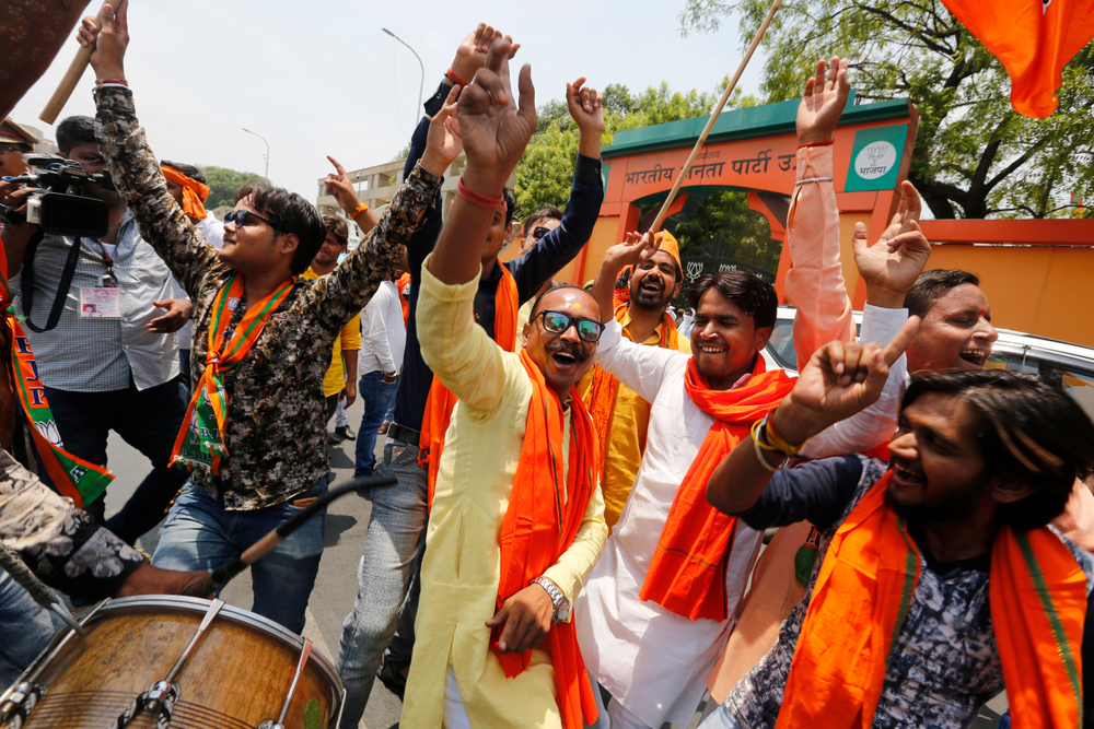 Bharatiya Janata Party (BJP) workers celebrate at BJP headquarters in, Lucknow, India, Thursday, May 23, 2019. Indian Prime Minister Narendra Modi and his party were off to an early lead as vote counting began Thursday following the conclusion of the country's 6-week-long general election, sending the stock market soaring in anticipation of another five-year term for the Hindu nationalist leader.(AP Photo/Rajesh Kumar Singh) Bharatiya Janata Party (BJP) workers celebrate at BJP headquarters in, Lucknow, India, Thursday, May 23, 2019. Indian Prime Minister Narendra Modi and his party were off to an early lead as vote counting began Thursday following the conclusion of the country's 6-week-long general election, sending the stock market soaring in anticipation of another five-year term for the Hindu nationalist leader.(AP Photo/Rajesh Kumar Singh)