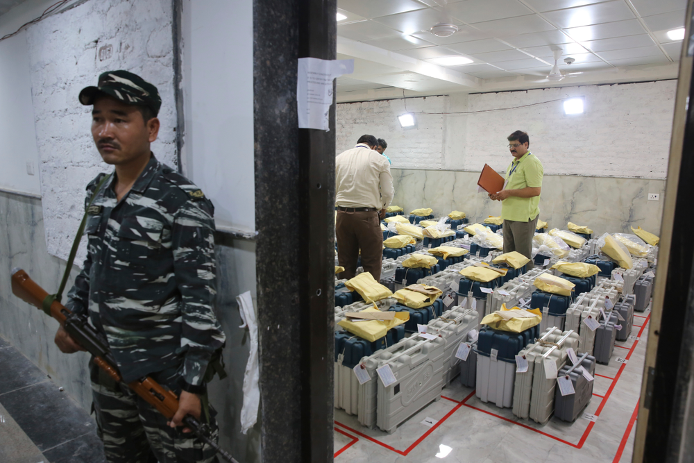 An Indian paramilitary soldier stands guard outside a room where voting machines are stored as counting of votes in India's massive general elections begins in New Delhi, India, Thursday, May 23, 2019. The count is expected to conclude by the evening, with strong trends visible by midday. (AP Photo/Manish Swarup) An Indian paramilitary soldier stands guard outside a room where voting machines are stored as counting of votes in India's massive general elections begins in New Delhi, India, Thursday, May 23, 2019. The count is expected to conclude by the evening, with strong trends visible by midday. (AP Photo/Manish Swarup)