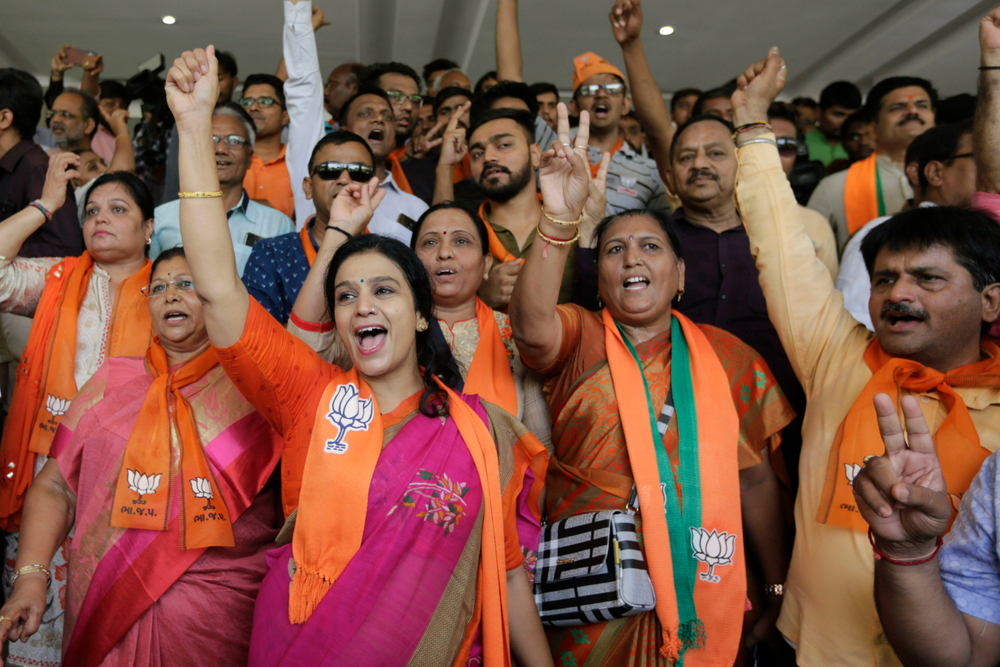 Supporters of India's ruling Bharatiya Janata Party celebrates early trends of party's victory in general elections at party's state head quarter in Gandhinagar, India, Thursday, May 23, 2019. (AP Photo/Ajit Solanki) Supporters of India's ruling Bharatiya Janata Party celebrates early trends of party's victory in general elections at party's state head quarter in Gandhinagar, India, Thursday, May 23, 2019. (AP Photo/Ajit Solanki)