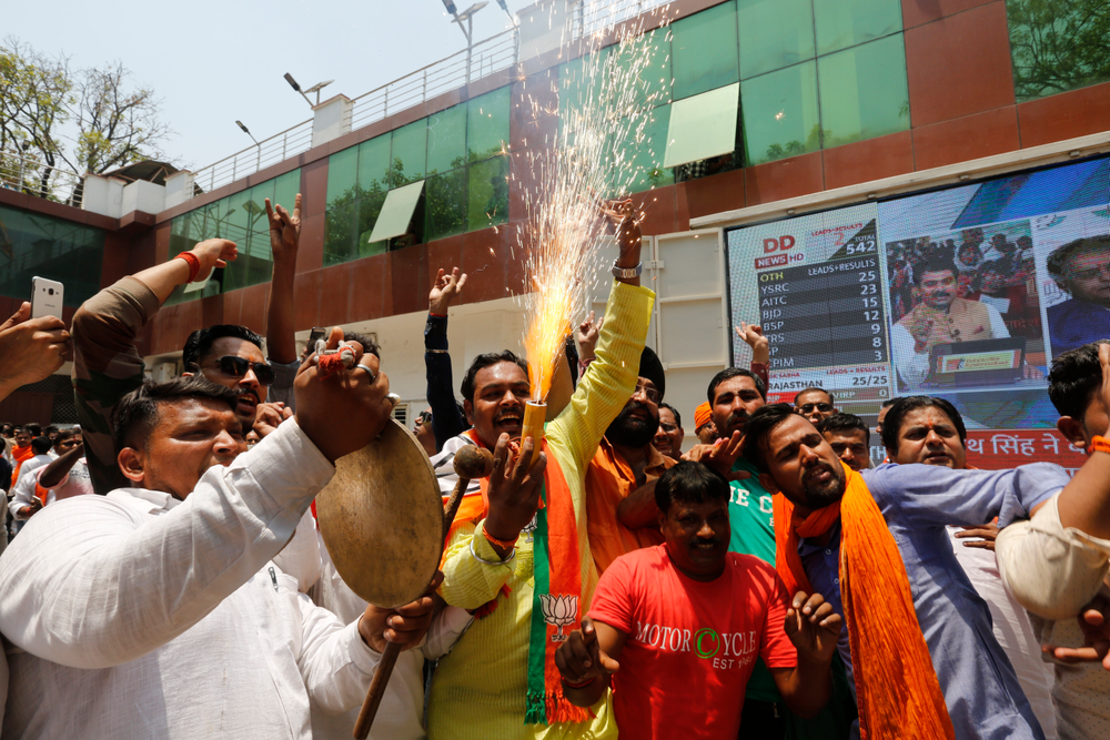 Bharatiya Janata Party (BJP) workers celebrate at BJP headquarters in, Lucknow, India, Thursday, May 23, 2019. Indian Prime Minister Narendra Modi and his party were off to an early lead as vote counting began Thursday following the conclusion of the country's 6-week-long general election, sending the stock market soaring in anticipation of another five-year term for the Hindu nationalist leader.(AP Photo/Rajesh Kumar Singh) Bharatiya Janata Party (BJP) workers celebrate at BJP headquarters in, Lucknow, India, Thursday, May 23, 2019. Indian Prime Minister Narendra Modi and his party were off to an early lead as vote counting began Thursday following the conclusion of the country's 6-week-long general election, sending the stock market soaring in anticipation of another five-year term for the Hindu nationalist leader.(AP Photo/Rajesh Kumar Singh)
