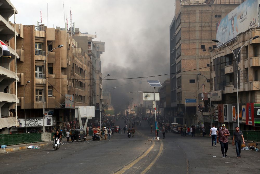Fires set by protesters close roads during ongoing anti-government protests in Baghdad, Iraq, Sunday, Nov. 3, 2019. Iraqi protesters have begun blocking roads in Baghdad to raise pressure on the government to resign. (AP Photo/Hadi Mizban) Fires set by protesters close roads during ongoing anti-government protests in Baghdad, Iraq, Sunday, Nov. 3, 2019. Iraqi protesters have begun blocking roads in Baghdad to raise pressure on the government to resign. (AP Photo/Hadi Mizban)