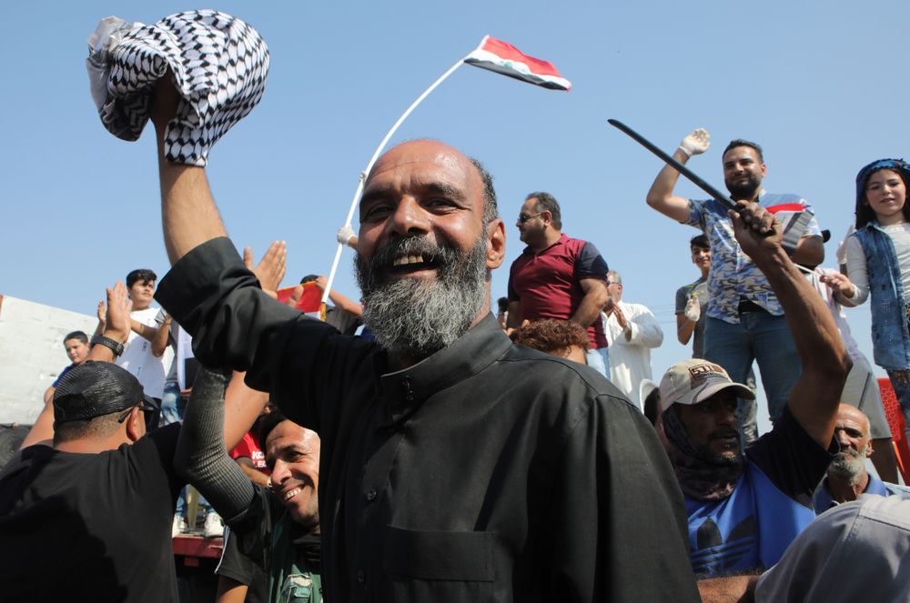 Anti-government protesters block the port of Umm Qasr a day after clashes between security forces and protesters, in Basra, Iraq, Sunday, Nov. 3, 2019. (AP Photo/Nabil al-Jourani) Anti-government protesters block the port of Umm Qasr a day after clashes between security forces and protesters, in Basra, Iraq, Sunday, Nov. 3, 2019. (AP Photo/Nabil al-Jourani)