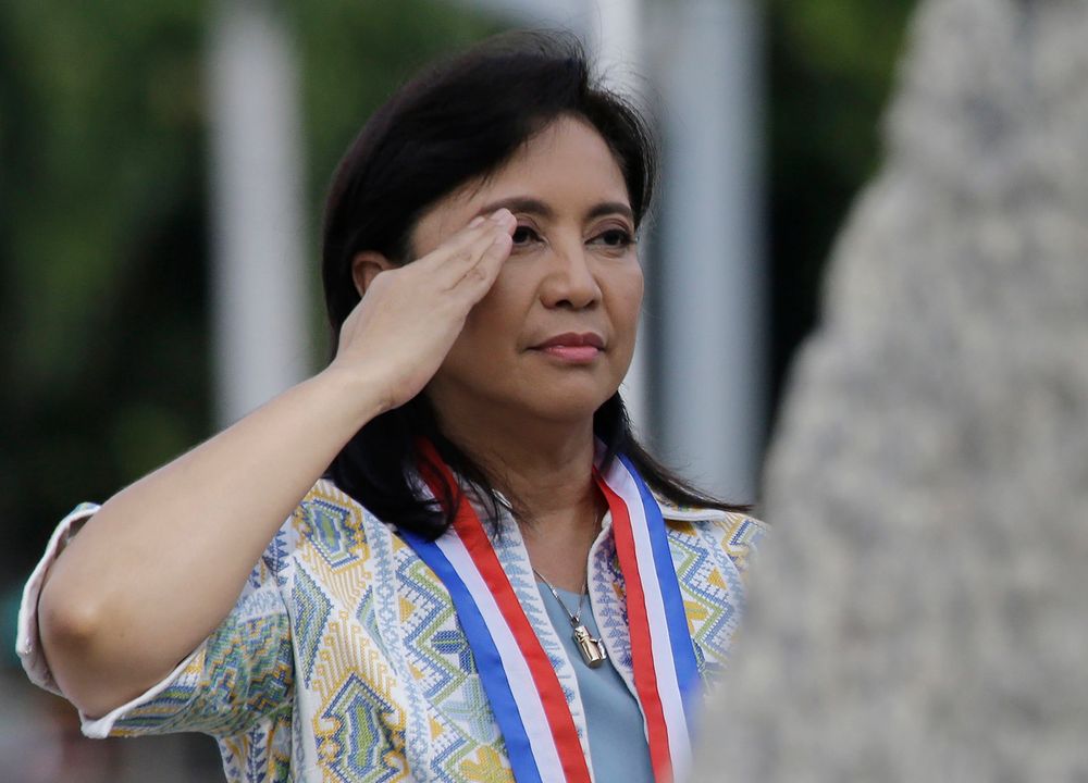 FILE - In this June 12, 2019 file photo, Philippine Vice President Leni Robredo salutes during a wreath-laying ceremony to mark the 121st anniversary of Philippine independence at Manila's Rizal Park, Philippines. Officials say police have filed sedition and other criminal complaints against the vice president, three opposition senators, four Roman Catholic bishops and a university president for allegedly conniving to destabilize President Rodrigo Duterte's administration. (AP Photo/Aaron Favila) FILE - In this June 12, 2019 file photo, Philippine Vice President Leni Robredo salutes during a wreath-laying ceremony to mark the 121st anniversary of Philippine independence at Manila's Rizal Park, Philippines. Officials say police have filed sedition and other criminal complaints against the vice president, three opposition senators, four Roman Catholic bishops and a university president for allegedly conniving to destabilize President Rodrigo Duterte's administration. (AP Photo/Aaron Favila)