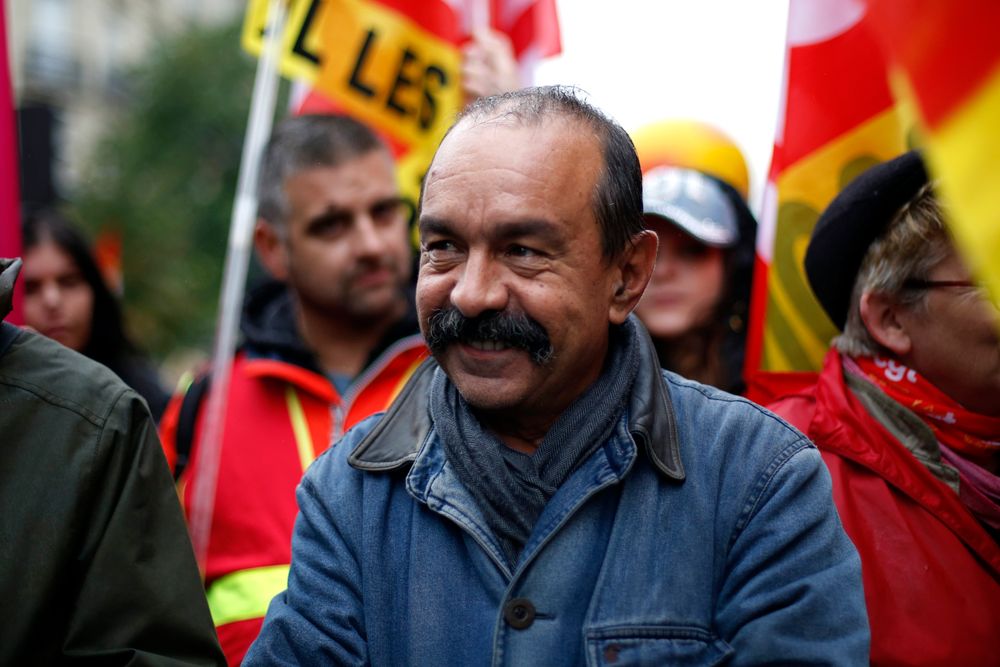 CGT labor union leader Philippe Martinez attends a march over the pension reform, in Paris, Tuesday, Sept. 24, 2019. Unions marches in Paris and other cities over the pension reform, which they fear will require people to work longer and reduce pensions. France's current retirement age is 62. (AP Photo/Thibault Camus) CGT labor union leader Philippe Martinez attends a march over the pension reform, in Paris, Tuesday, Sept. 24, 2019. Unions marches in Paris and other cities over the pension reform, which they fear will require people to work longer and reduce pensions. France's current retirement age is 62. (AP Photo/Thibault Camus)