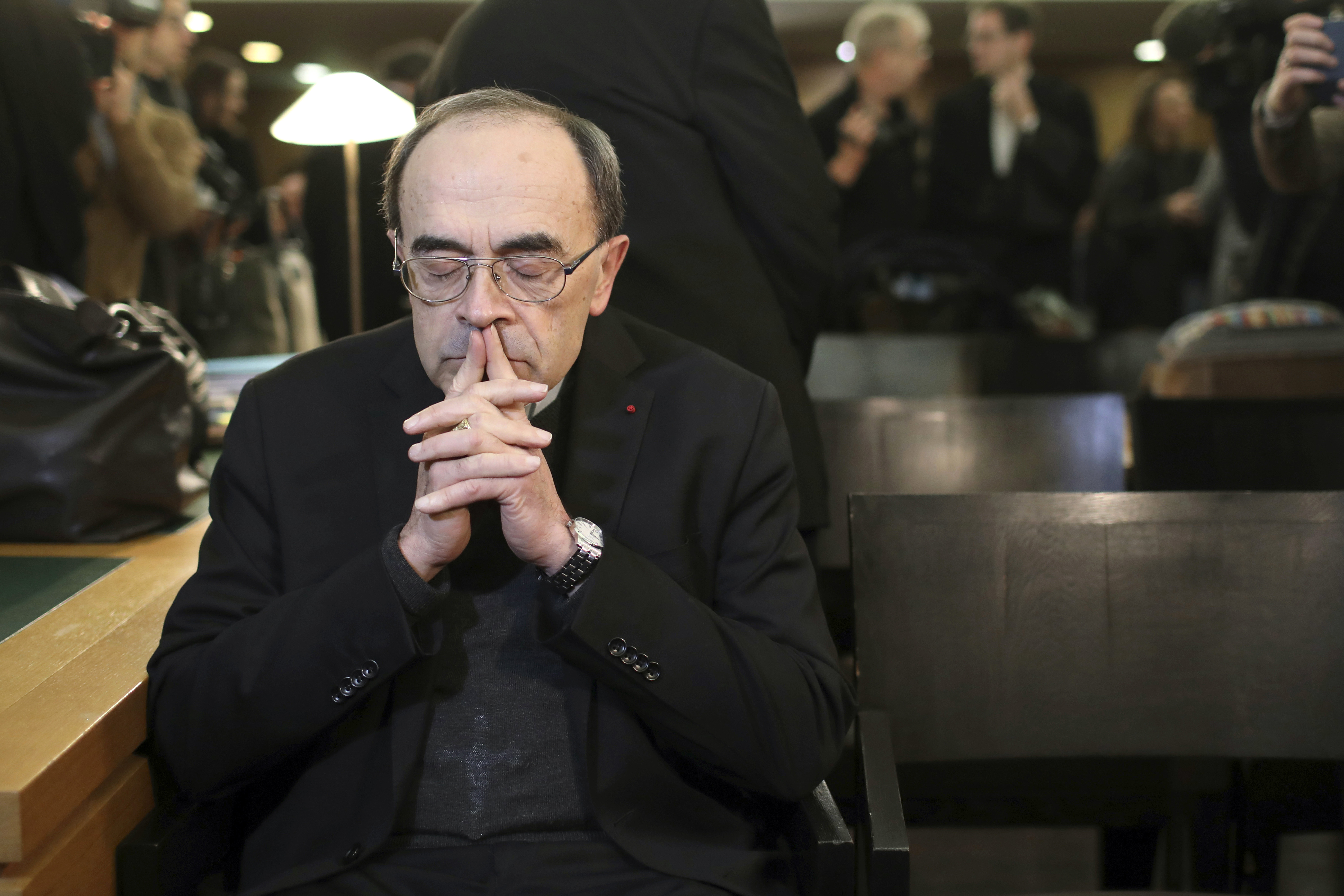 FILE - In this Jan. 7, 2019 file photo, French Cardinal Philippe Barbarin waits for the start of his trial at the Lyon courthouse, central France. Pope. A French court on Thursday March 7, 2019 is expected to acquit a cardinal and five other defendants accused of protecting a pedophile priest, but alleged victims say France's most important church sex abuse trial has at least allowed them to bring the affair into the open. (AP Photo/Laurent Cipriani, File) FILE - In this Jan. 7, 2019 file photo, French Cardinal Philippe Barbarin waits for the start of his trial at the Lyon courthouse, central France. Pope. A French court on Thursday March 7, 2019 is expected to acquit a cardinal and five other defendants accused of protecting a pedophile priest, but alleged victims say France's most important church sex abuse trial has at least allowed them to bring the affair into the open. (AP Photo/Laurent Cipriani, File)