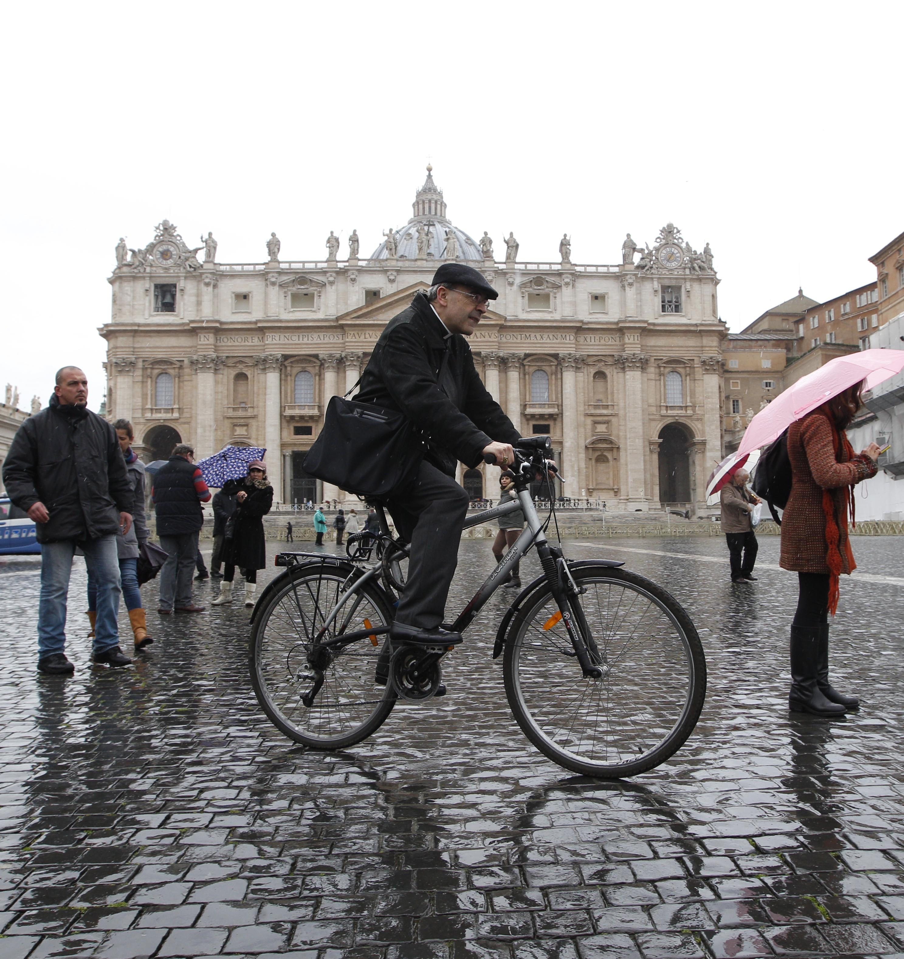 FILE - In this Friday, March 8, 2013 file photo, French Cardinal Philippe Barbarin rides his bicycle in St. Peter's Square after a meeting at the Vatican. A French court has found top Catholic official Cardinal Philippe Barbarin guilty for failing to report to justice accusations against a pedophile priest. In a surprise decision Thursday, March 7, 2019 in France's most important church sex abuse trial, the Lyon court handed Barbarin a six-month suspended prison sentence for not reporting the facts in the period between July 2014 and June 2015. (AP Photo/Alessandra Tarantino, File ) FILE - In this Friday, March 8, 2013 file photo, French Cardinal Philippe Barbarin rides his bicycle in St. Peter's Square after a meeting at the Vatican. A French court has found top Catholic official Cardinal Philippe Barbarin guilty for failing to report to justice accusations against a pedophile priest. In a surprise decision Thursday, March 7, 2019 in France's most important church sex abuse trial, the Lyon court handed Barbarin a six-month suspended prison sentence for not reporting the facts in the period between July 2014 and June 2015. (AP Photo/Alessandra Tarantino, File )