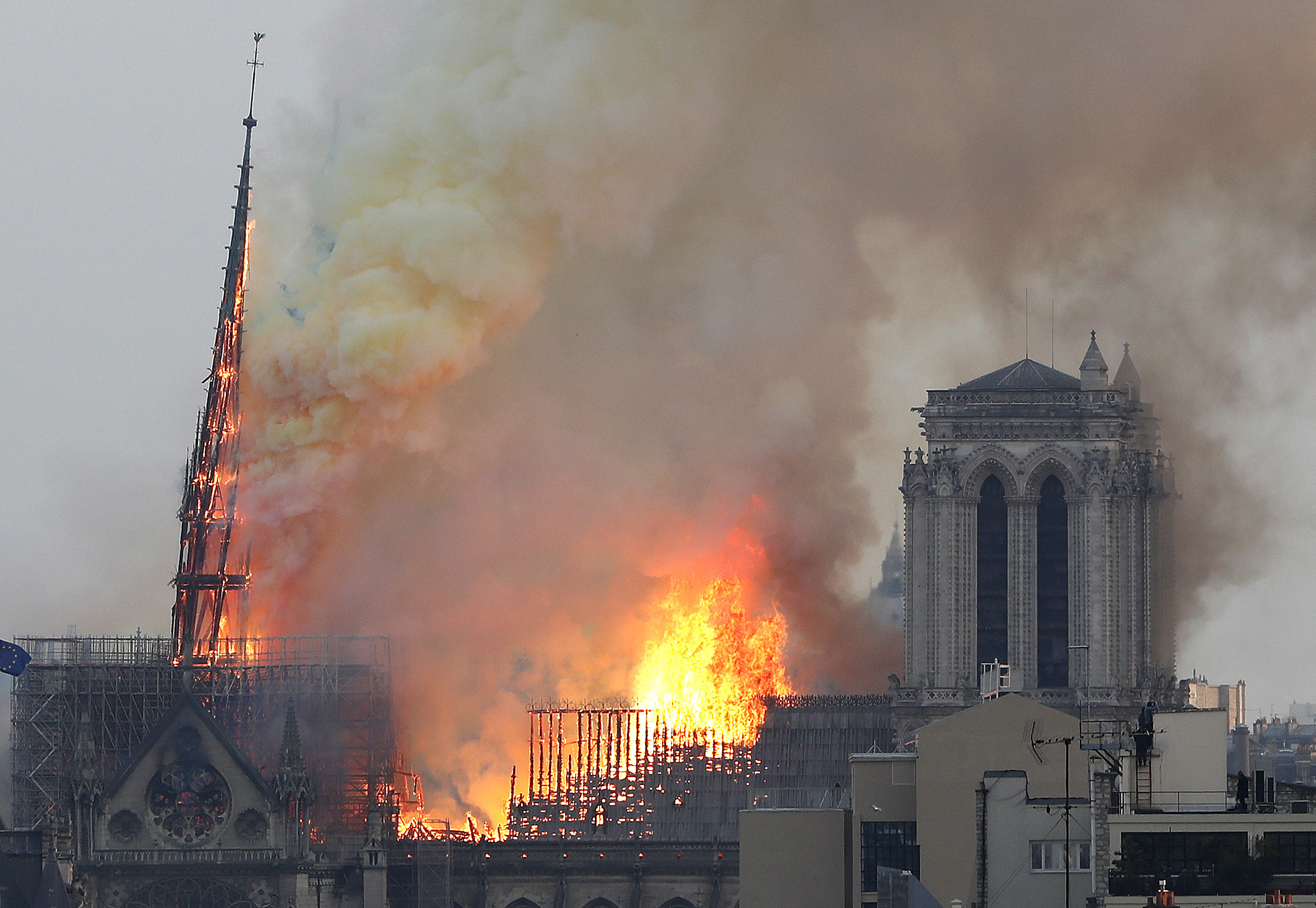 Flames rise from Notre Dame cathedral as it burns in Paris, Monday, April 15, 2019. Massive plumes of yellow brown smoke is filling the air above Notre Dame Cathedral and ash is falling on tourists and others around the island that marks the center of Paris. (AP Photo/Thibault Camus) Flames rise from Notre Dame cathedral as it burns in Paris, Monday, April 15, 2019. Massive plumes of yellow brown smoke is filling the air above Notre Dame Cathedral and ash is falling on tourists and others around the island that marks the center of Paris. (AP Photo/Thibault Camus)