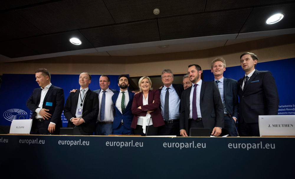 French far-right National Rally leader and MEP Marine Le Pen, center, poses with other far-right members during a media conference to announce the formation of a new far-right European Parliament group at the European Parliament in Brussels, Thursday, June 13, 2019. From left, Czech Republic's Tomio Okamura, Finland's Jussi Halla-Aho, Austria's Harald Vilimsky, Italy's Marco Zanni, Germany's Joerg Meuthen, Belgium's Gerolf Annemans, France's Nicolas Bay, Denmark's Peter Kofod and Estonia's Jaak Madison. (AP Photo/Virginia Mayo) French far-right National Rally leader and MEP Marine Le Pen, center, poses with other far-right members during a media conference to announce the formation of a new far-right European Parliament group at the European Parliament in Brussels, Thursday, June 13, 2019. From left, Czech Republic's Tomio Okamura, Finland's Jussi Halla-Aho, Austria's Harald Vilimsky, Italy's Marco Zanni, Germany's Joerg Meuthen, Belgium's Gerolf Annemans, France's Nicolas Bay, Denmark's Peter Kofod and Estonia's Jaak Madison. (AP Photo/Virginia Mayo)