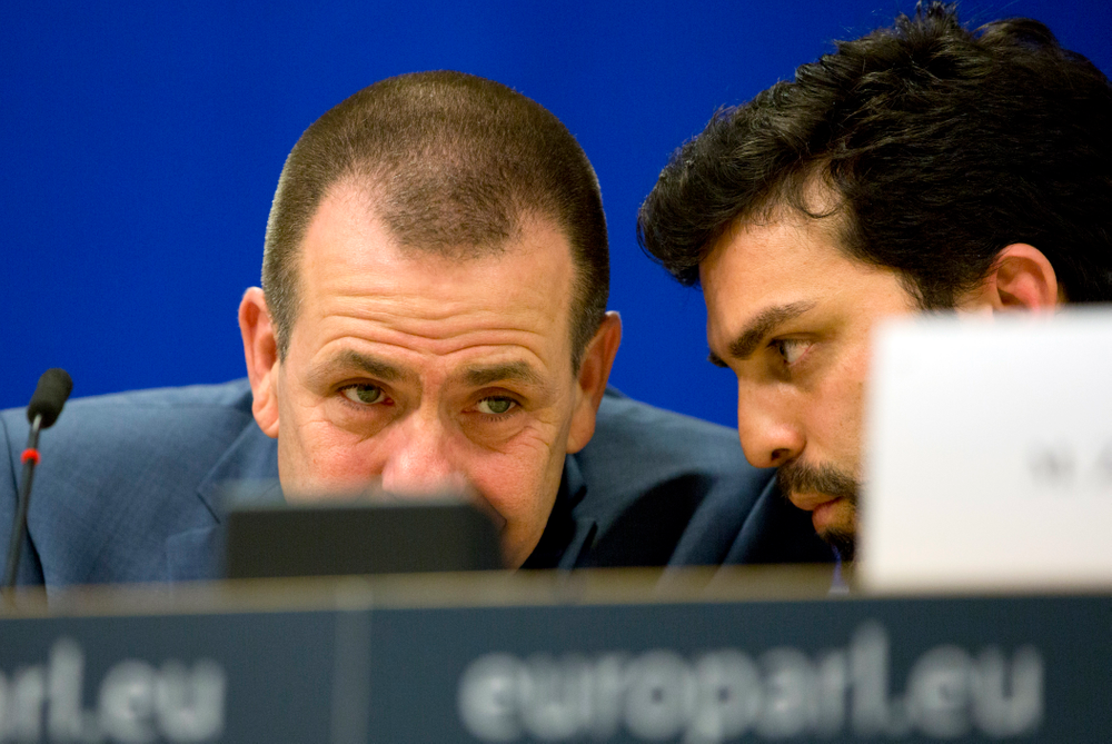 Italy's Lega party member and MEP Marco Zanni, right, speaks with Austria's FPO member and MEP Harald Vilimsky during a media conference to announce the formation of a new far-right European Parliament group at the European Parliament in Brussels, Thursday, June 13, 2019. (AP Photo/Virginia Mayo) Italy's Lega party member and MEP Marco Zanni, right, speaks with Austria's FPO member and MEP Harald Vilimsky during a media conference to announce the formation of a new far-right European Parliament group at the European Parliament in Brussels, Thursday, June 13, 2019. (AP Photo/Virginia Mayo)