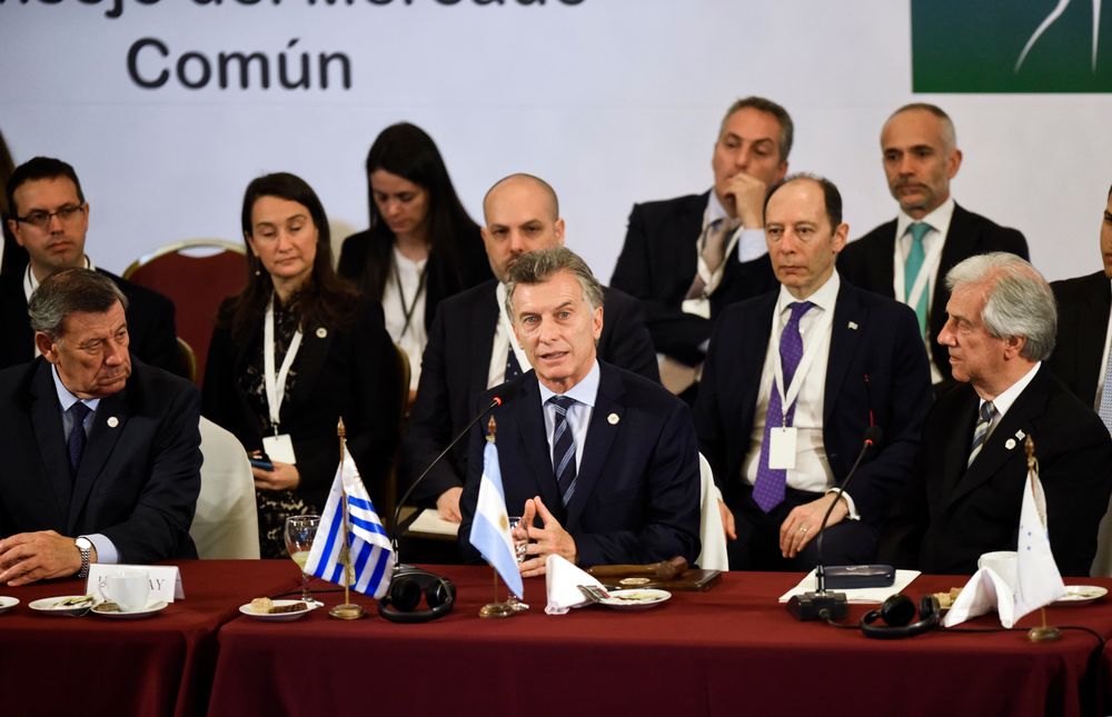 FILE - In this Dec. 18, 2018 file photo, Argentina's President Mauricio Macri speaks as the new pro tempore president of Mercosur, flanked by Uruguay's Foreign Affairs Minister, Rodolfo Nin, left and Uruguay's President Tabare Vazquez, right, at the 53rd Mercosur Summit in Montevideo, Uruguay. Argentina's Foreign Ministry said in a statement Friday, June 28, 2019, that South America's Mercosur trade bloc has struck a FILE - In this Dec. 18, 2018 file photo, Argentina's President Mauricio Macri speaks as the new pro tempore president of Mercosur, flanked by Uruguay's Foreign Affairs Minister, Rodolfo Nin, left and Uruguay's President Tabare Vazquez, right, at the 53rd Mercosur Summit in Montevideo, Uruguay. Argentina's Foreign Ministry said in a statement Friday, June 28, 2019, that South America's Mercosur trade bloc has struck a