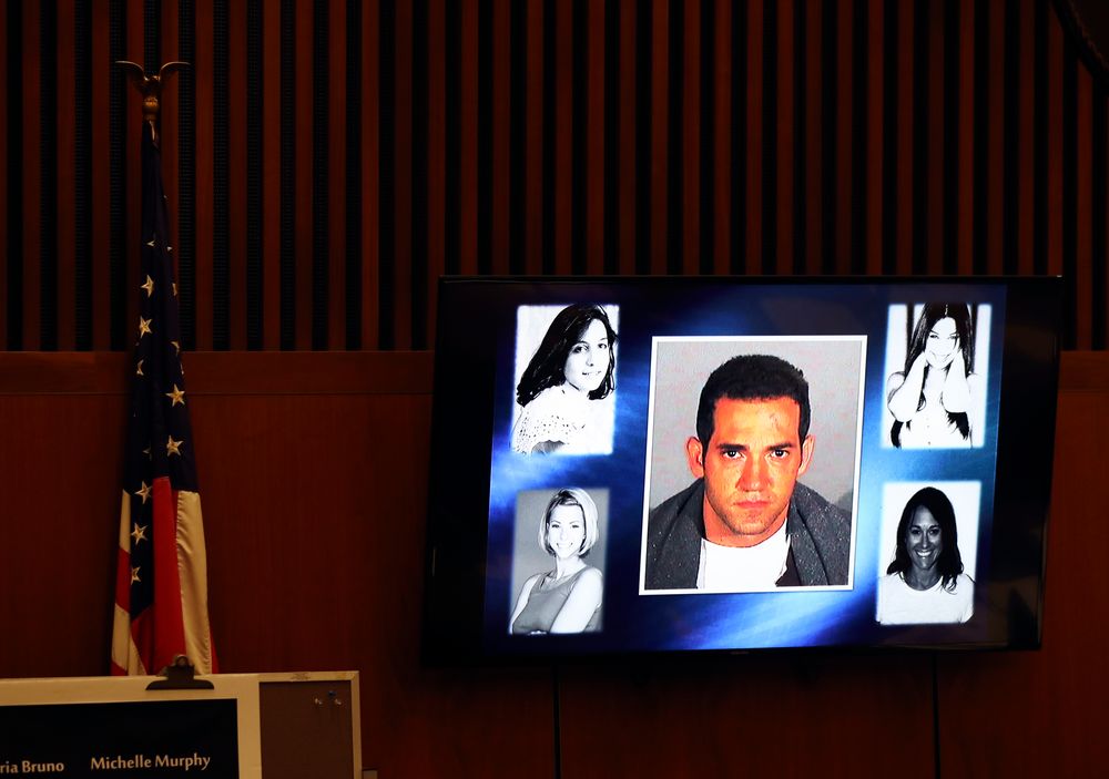 A picture of defendant Michael Gargiulo, center, and his victims is flashed on a screen during closing arguments for the trial of People vs. Michael Gargiulo Tuesday, Aug. 6, 2019, in Los Angeles. Closing arguments started Tuesday in the trial of an air conditioning repairman charged with killing two Southern California women and attempting to kill a third. (Lucy Nicholson, Pool Photo via AP) A picture of defendant Michael Gargiulo, center, and his victims is flashed on a screen during closing arguments for the trial of People vs. Michael Gargiulo Tuesday, Aug. 6, 2019, in Los Angeles. Closing arguments started Tuesday in the trial of an air conditioning repairman charged with killing two Southern California women and attempting to kill a third. (Lucy Nicholson, Pool Photo via AP)