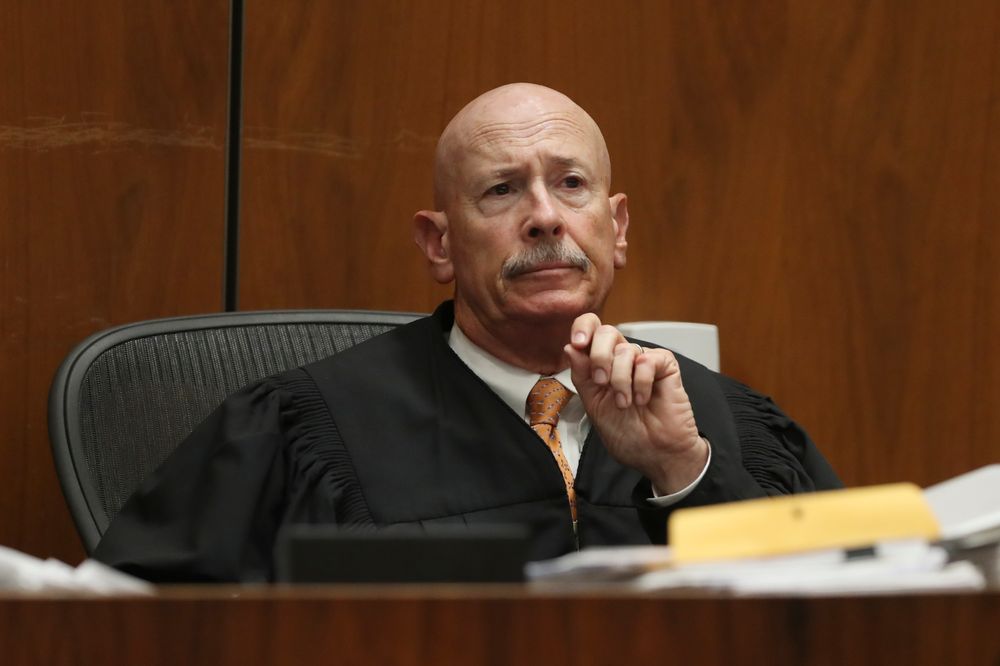 Judge Larry P. Fidler listens to closing arguments in the trial of People vs. Michael Gargiulo Tuesday, Aug. 6, 2019, in Los Angeles. Closing arguments started Tuesday in the trial of an air conditioning repairman charged with killing two Southern California women and attempting to kill a third. (Lucy Nicholson, Pool Photo via AP) Judge Larry P. Fidler listens to closing arguments in the trial of People vs. Michael Gargiulo Tuesday, Aug. 6, 2019, in Los Angeles. Closing arguments started Tuesday in the trial of an air conditioning repairman charged with killing two Southern California women and attempting to kill a third. (Lucy Nicholson, Pool Photo via AP)