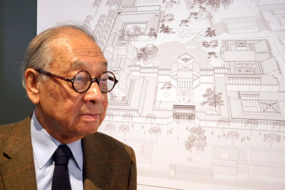 In this Nov. 3, 2003, photo, Chinese-American architect I.M. Pei stands with the plans of the Suzhou Museum in Suzhou in eastern China's Jiangsu Province. Pei, the versatile, globe-trotting architect who revived the Louvre with a giant glass pyramid and captured the spirit of rebellion at the multi-shaped Rock and Roll Hall of Fame, has died at age 102, a spokesman confirmed Thursday, May 16, 2019. (Chinatopix via AP) In this Nov. 3, 2003, photo, Chinese-American architect I.M. Pei stands with the plans of the Suzhou Museum in Suzhou in eastern China's Jiangsu Province. Pei, the versatile, globe-trotting architect who revived the Louvre with a giant glass pyramid and captured the spirit of rebellion at the multi-shaped Rock and Roll Hall of Fame, has died at age 102, a spokesman confirmed Thursday, May 16, 2019. (Chinatopix via AP)