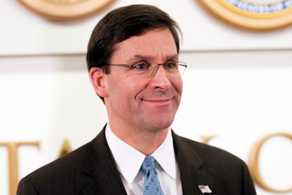 FILE - In this Nov. 6, 2019, file photo, U.S. Defense Secretary Mark Esper talks to the media with Qatar Deputy Prime Minister and Minister of Defense Khalid Al Attiyah at the Pentagon in Washington. Barely four months into his tenure, Esper is making his second trek across the Pacific. And yet it is the Middle East – most recently a near-war with Iran and an actual war in Syria – that in Washington commands more attention and demands more American troops. (AP Photo/Cliff Owen, File) FILE - In this Nov. 6, 2019, file photo, U.S. Defense Secretary Mark Esper talks to the media with Qatar Deputy Prime Minister and Minister of Defense Khalid Al Attiyah at the Pentagon in Washington. Barely four months into his tenure, Esper is making his second trek across the Pacific. And yet it is the Middle East – most recently a near-war with Iran and an actual war in Syria – that in Washington commands more attention and demands more American troops. (AP Photo/Cliff Owen, File)