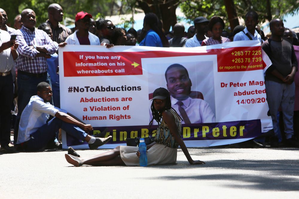 Zimbabwean doctors protest in Harare, Wednesday, Sept, 18, 2019. Zimbabwean doctors protesting the alleged abduction of a union leader were met by a line of baton- wielding police in the capital as fears grow about government repression. (AP Photo/Tsvangirayi Mukwazhi) Zimbabwean doctors protest in Harare, Wednesday, Sept, 18, 2019. Zimbabwean doctors protesting the alleged abduction of a union leader were met by a line of baton- wielding police in the capital as fears grow about government repression. (AP Photo/Tsvangirayi Mukwazhi)