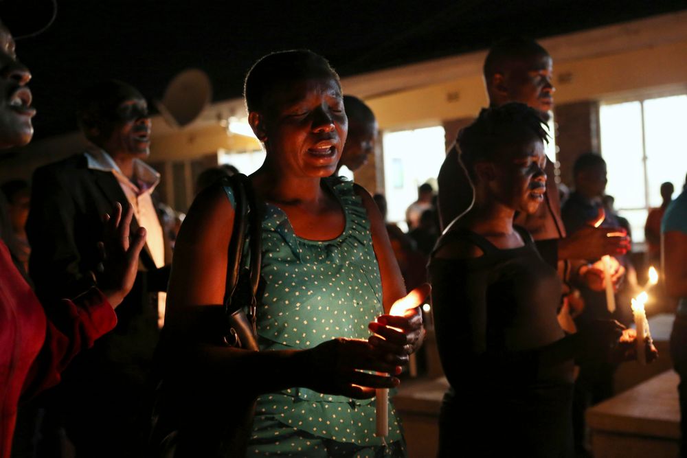 A night vigil prayer is held for a missing doctor, Peter Magombeyi, by well-wishers and fellow doctors at Harare hospital, Tuesday, Sept. 17, 2019. The Zimbabwe Hospitals Association has said that that their president, Peter Magombeyi, was abducted on Saturday, days after receiving threats on his phone. Magombeyi had expressed concerns to journalists about the poor state of Zimbabwe's hospitals.(AP Photo/Tsvangirayi Mukwazhi) A night vigil prayer is held for a missing doctor, Peter Magombeyi, by well-wishers and fellow doctors at Harare hospital, Tuesday, Sept. 17, 2019. The Zimbabwe Hospitals Association has said that that their president, Peter Magombeyi, was abducted on Saturday, days after receiving threats on his phone. Magombeyi had expressed concerns to journalists about the poor state of Zimbabwe's hospitals.(AP Photo/Tsvangirayi Mukwazhi)
