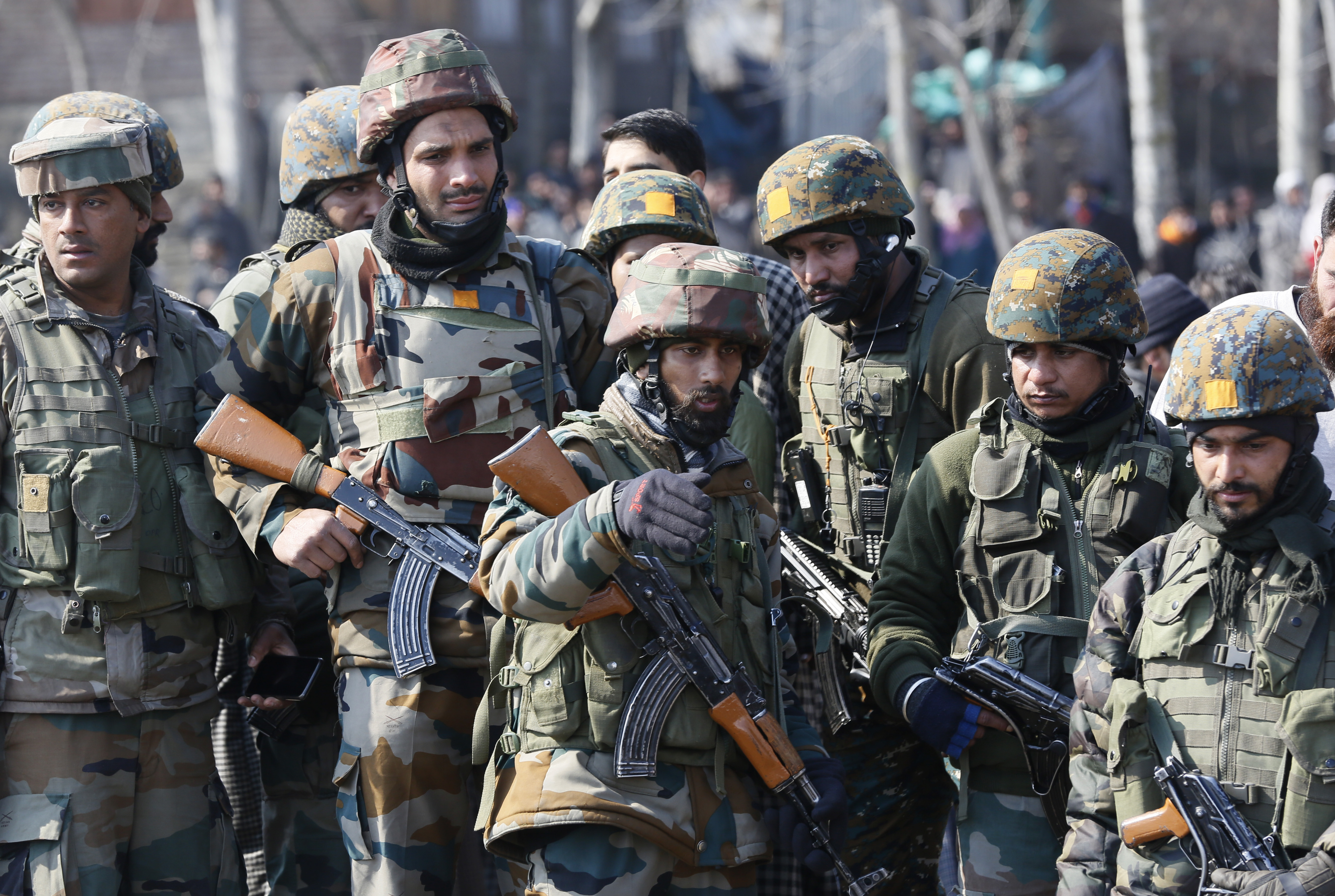 Indian army soldiers stand near the wreckage of an Indian aircraft after it crashed in Budgam area, outskirts of Srinagar, Indian controlled Kashmir, Wednesday, Feb.27, 2019. (AP Photo/Mukhtar Khan) Indian army soldiers stand near the wreckage of an Indian aircraft after it crashed in Budgam area, outskirts of Srinagar, Indian controlled Kashmir, Wednesday, Feb.27, 2019. (AP Photo/Mukhtar Khan)