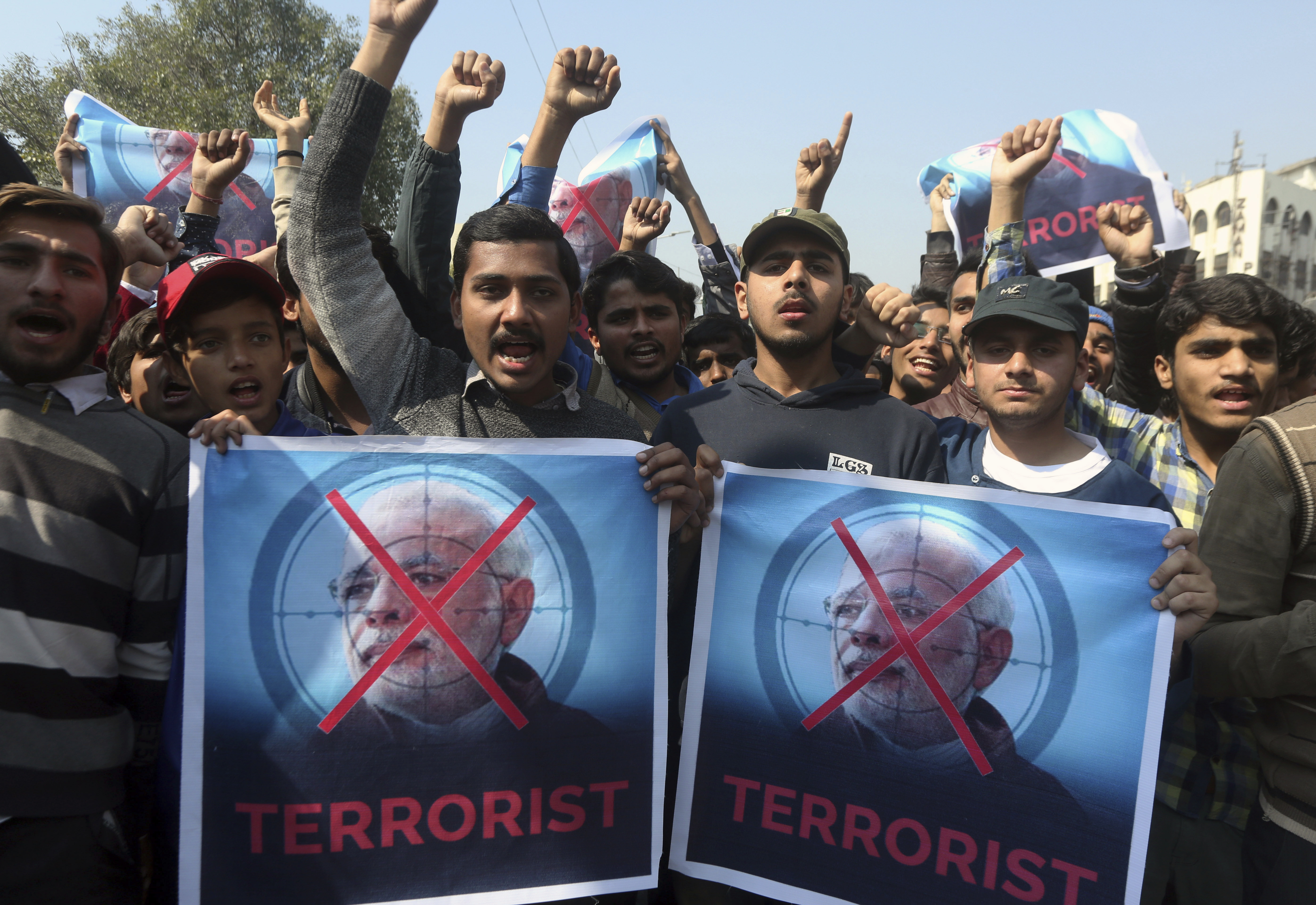 Supporters of a Pakistani religious group Islami Jamiat-e-Talaba chant slogans at a rally to condemn Indian aggression, Wednesday, Feb. 27, 2019. Pakistan's air force shot down two Indian warplanes after they crossed the boundary between the two nuclear-armed rivals in the disputed territory of Kashmir on Wednesday and captured one Indian pilot, a military spokesman said. (AP Photo/K.M. Chaudary) Supporters of a Pakistani religious group Islami Jamiat-e-Talaba chant slogans at a rally to condemn Indian aggression, Wednesday, Feb. 27, 2019. Pakistan's air force shot down two Indian warplanes after they crossed the boundary between the two nuclear-armed rivals in the disputed territory of Kashmir on Wednesday and captured one Indian pilot, a military spokesman said. (AP Photo/K.M. Chaudary)