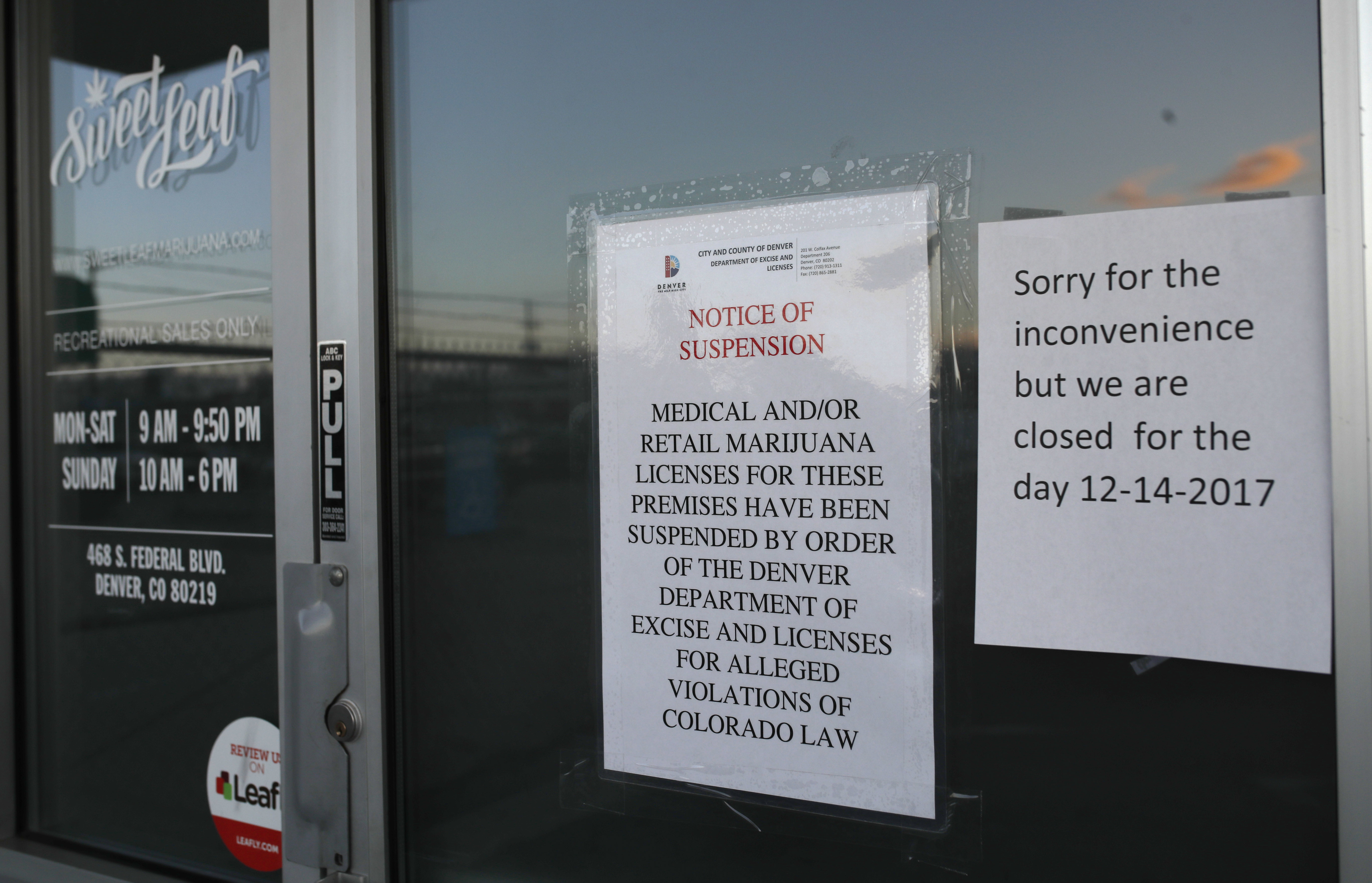 FILE - In this Dec. 14, 2017 file photo closed signs are displayed on the front door to a marijuana dispensary along South Federal Boulevard in south Denver. The owners of the Denver marijuana business pleaded guilty Friday, Jan. 25, 2019 to drug and racketeering charges stemming from a yearlong grand jury investigation that prosecutors say uncovered more than two tons of marijuana entering the black market.(AP Photo/David Zalubowski,File) FILE - In this Dec. 14, 2017 file photo closed signs are displayed on the front door to a marijuana dispensary along South Federal Boulevard in south Denver. The owners of the Denver marijuana business pleaded guilty Friday, Jan. 25, 2019 to drug and racketeering charges stemming from a yearlong grand jury investigation that prosecutors say uncovered more than two tons of marijuana entering the black market.(AP Photo/David Zalubowski,File)