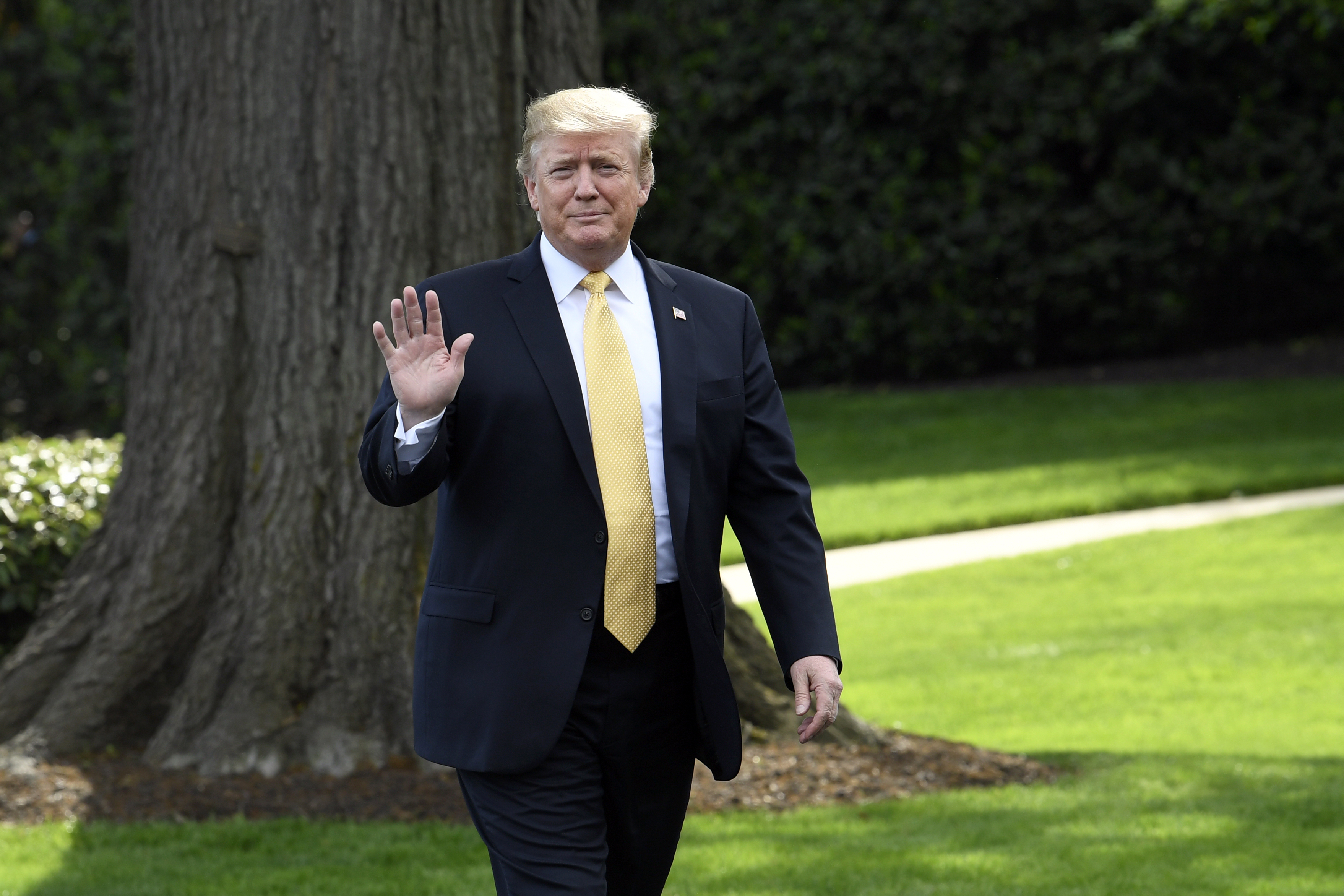 President Donald Trump waves as he arrives to speak on the South Lawn of the White House in Washington, Thursday, April 25, 2019, as part of the activities for Take Our Daughters and Sons to Work Day at the White House. (AP Photo/Susan Walsh) President Donald Trump waves as he arrives to speak on the South Lawn of the White House in Washington, Thursday, April 25, 2019, as part of the activities for Take Our Daughters and Sons to Work Day at the White House. (AP Photo/Susan Walsh)